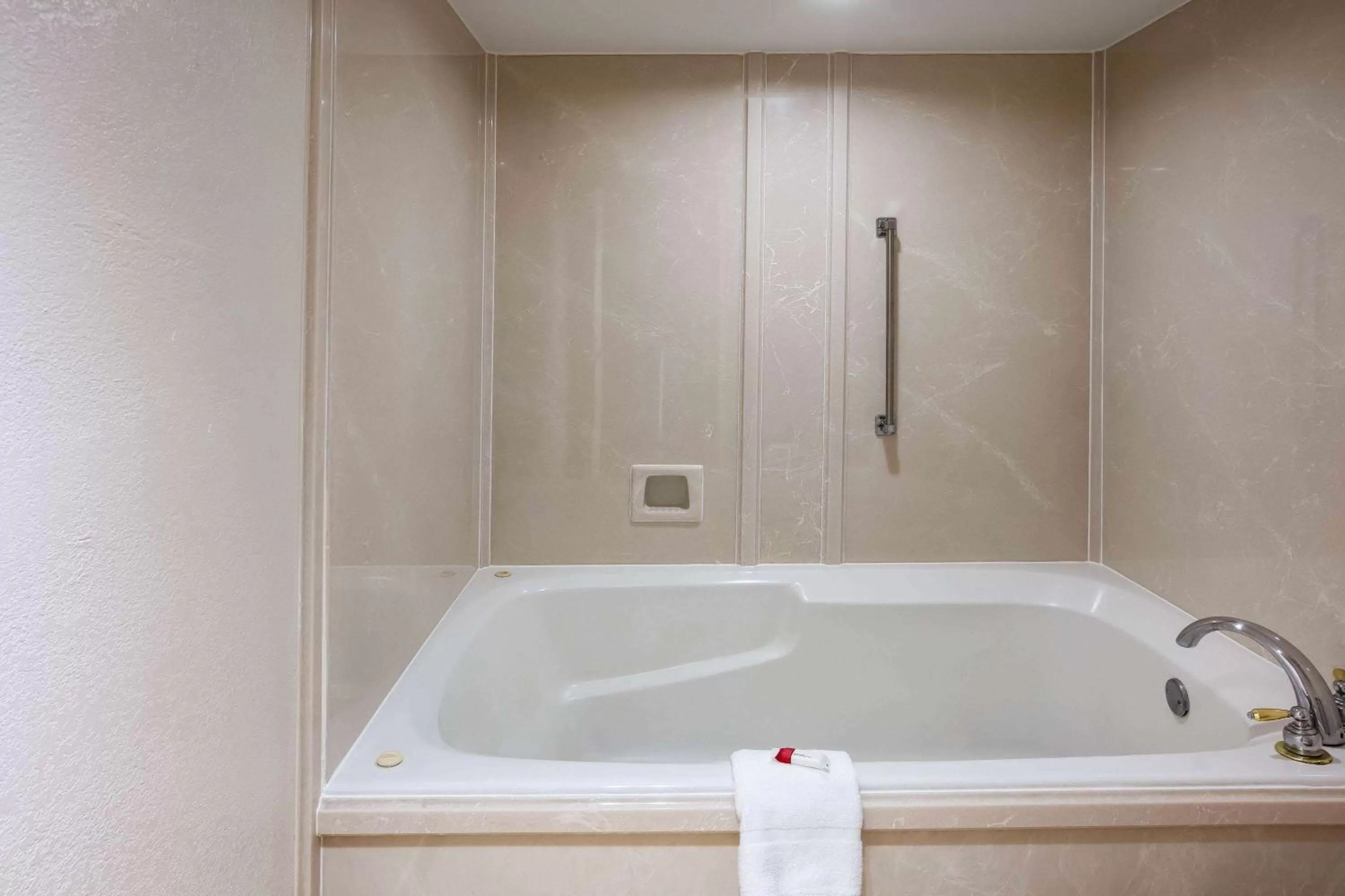 Bathroom in Days Inn & Suites by Wyndham Tyler