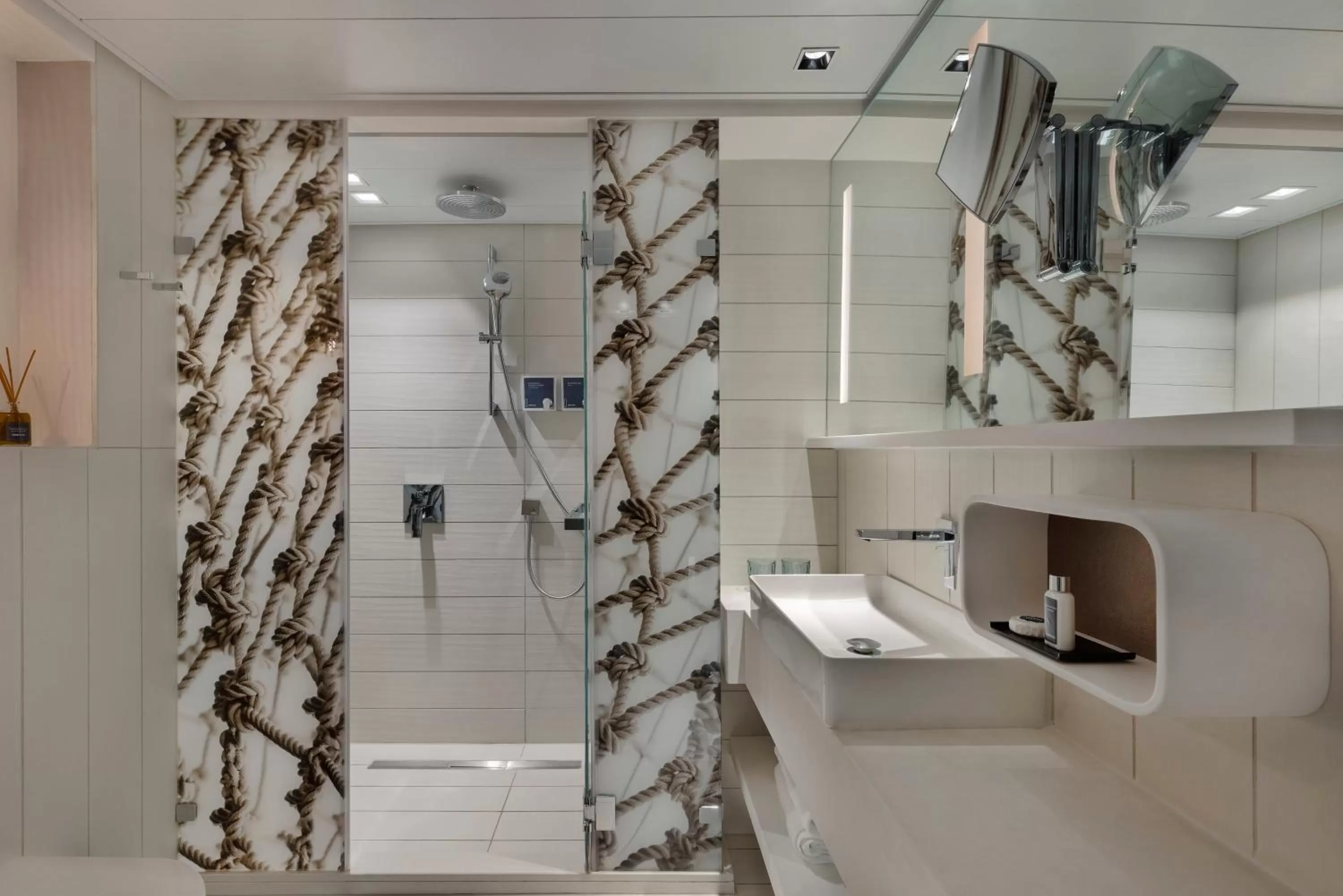 Bathroom in Port Tower by Isrotel Design
