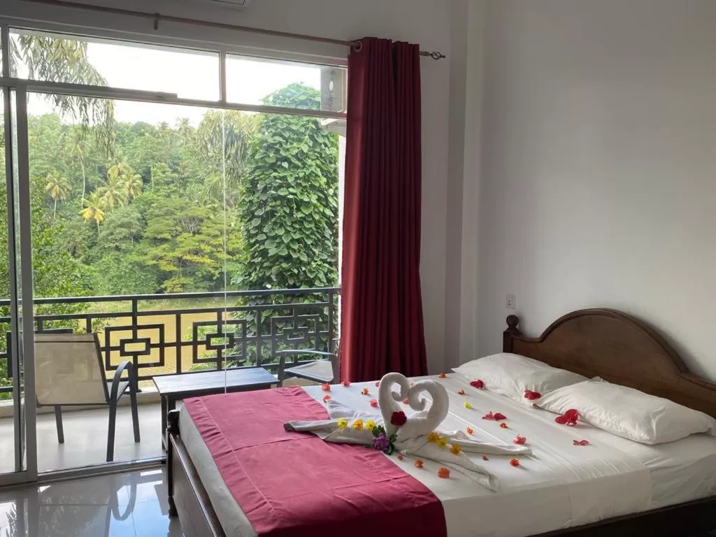 Bed in Kandy Rivers Edge Nature Resort