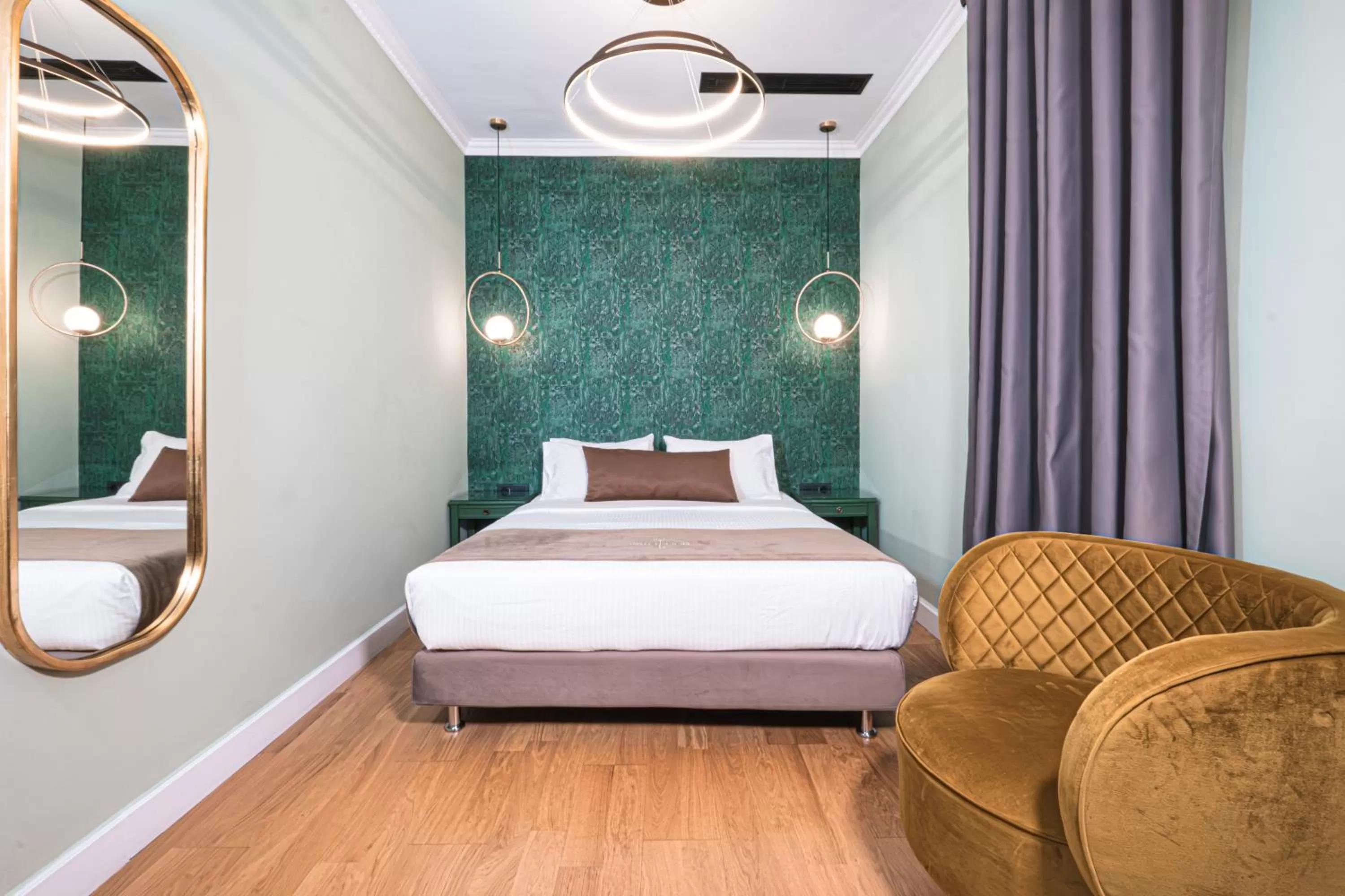 Bed in Belle Epoque Suites