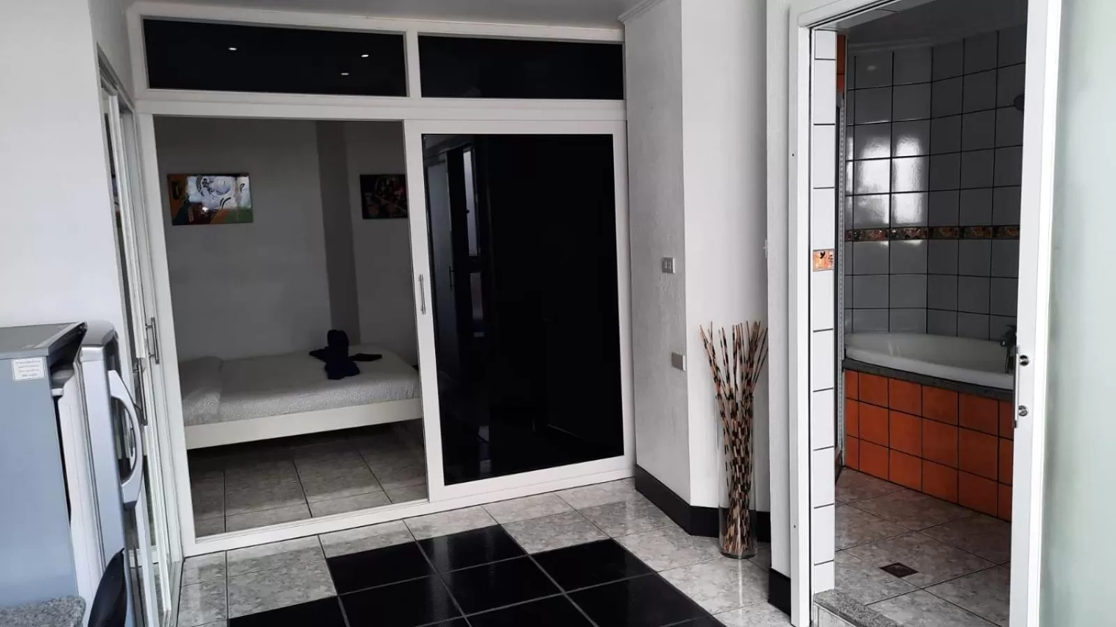 Photo of the whole room, Bathroom in Swiss Food Restaurant and room for rent