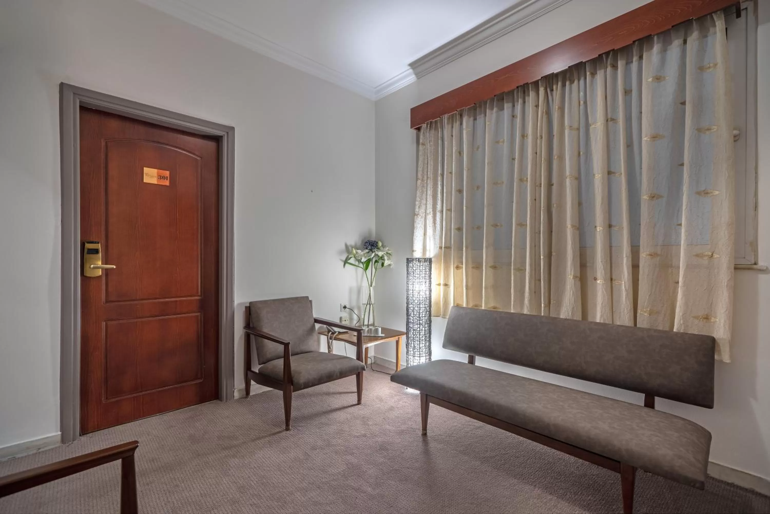 Communal lounge/ TV room in Attalos Hotel