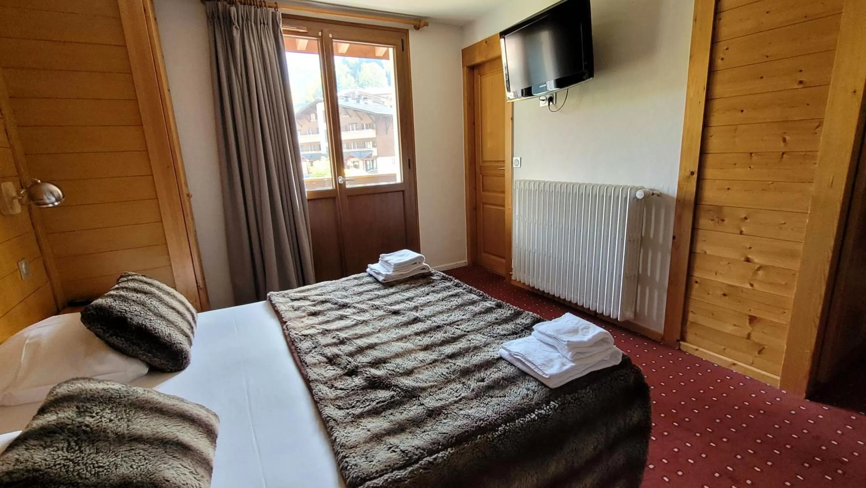 Bed in Hotel Christiania