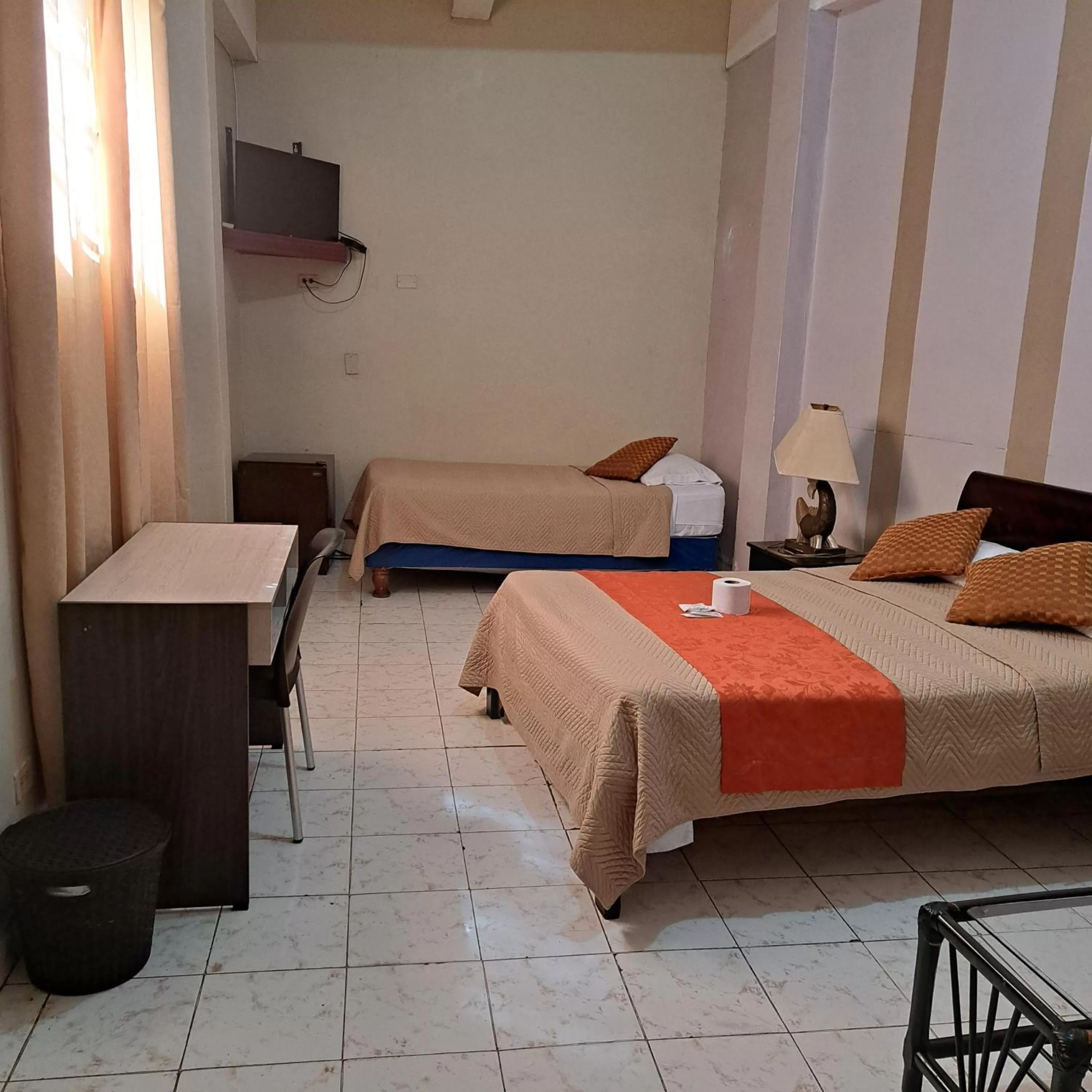 Photo of the whole room, Bed in Atlantic Suites Hotel