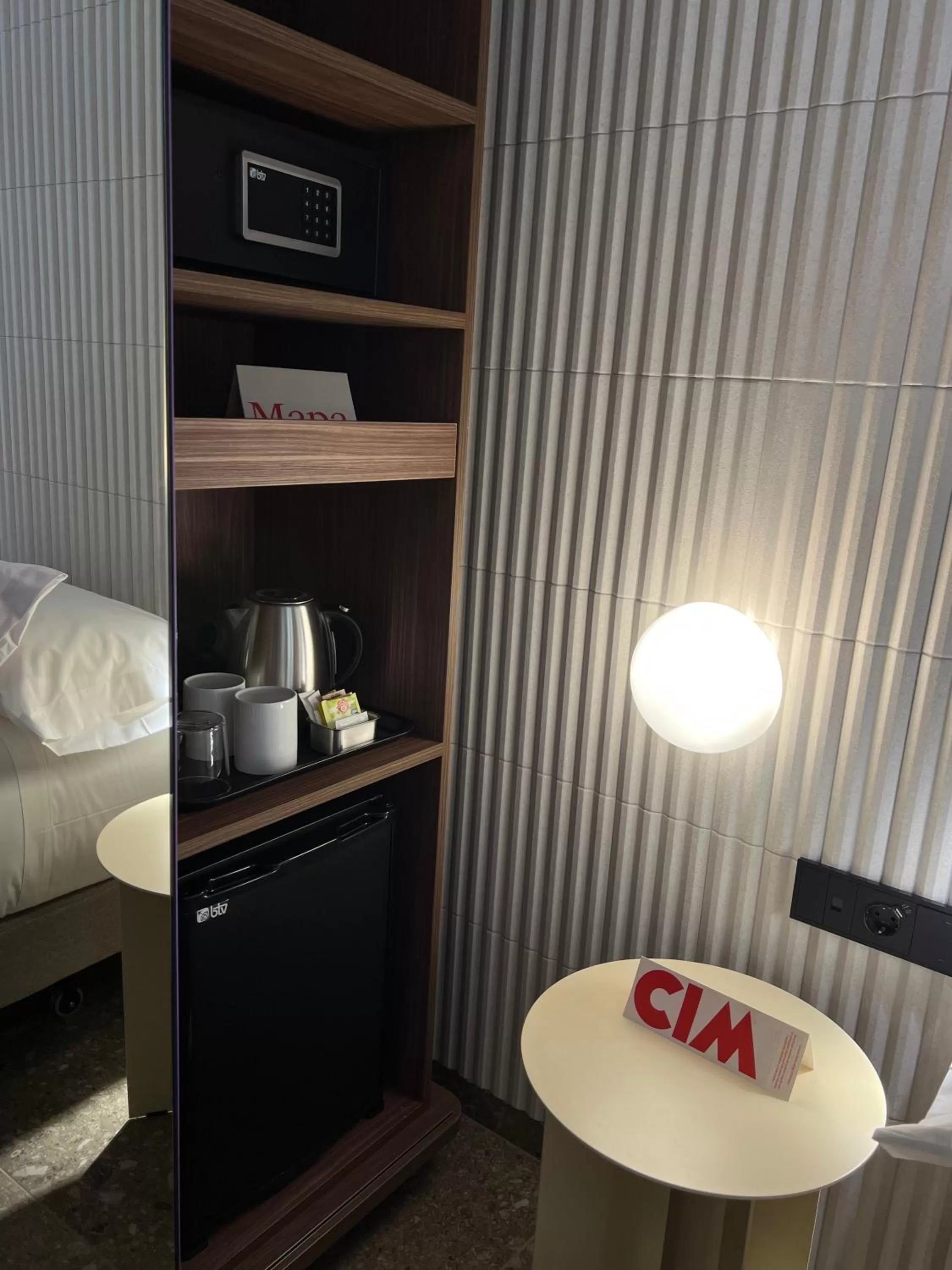 Bed in CIM HOTEL BOUTIQUE