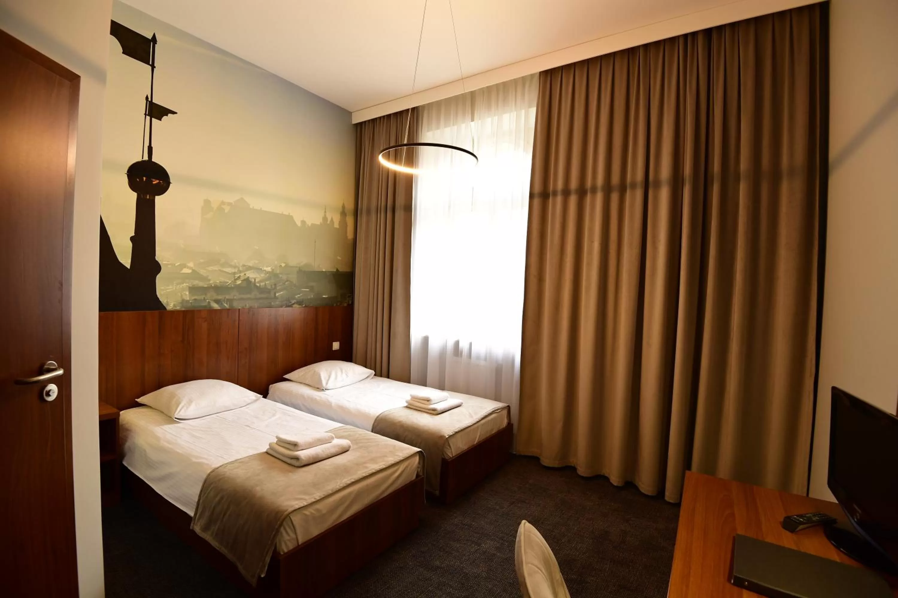 Bed in Hotel Downtown Kraków