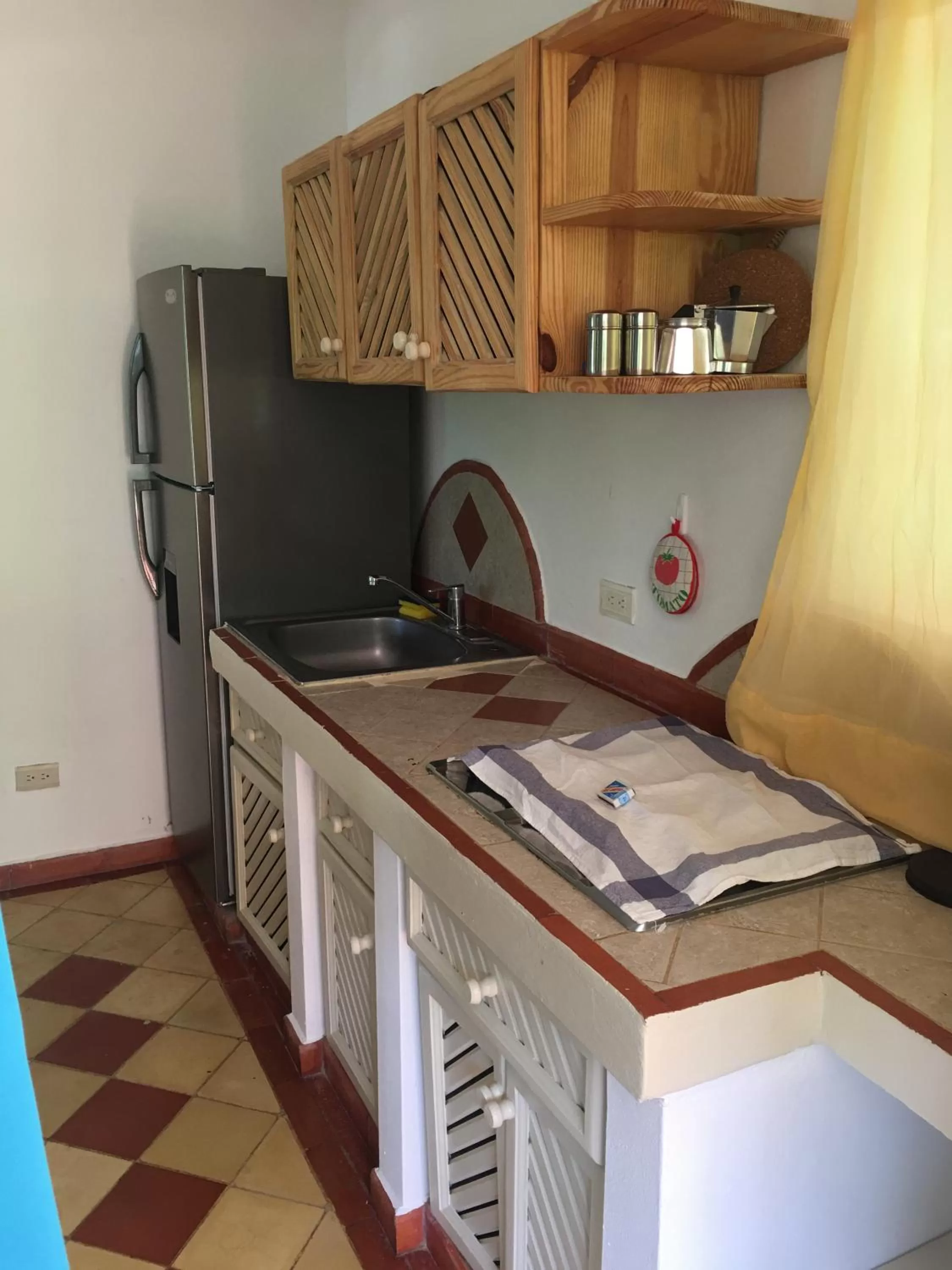 Kitchen/Kitchenette in Hotel - Residencial Madrugada