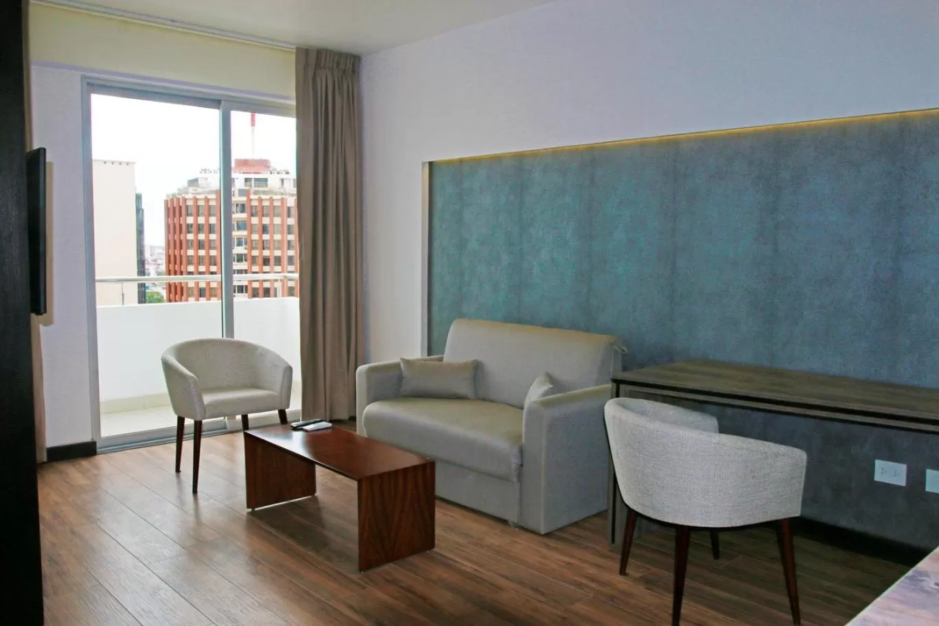 Living room in Urban Suites Apart Hotel