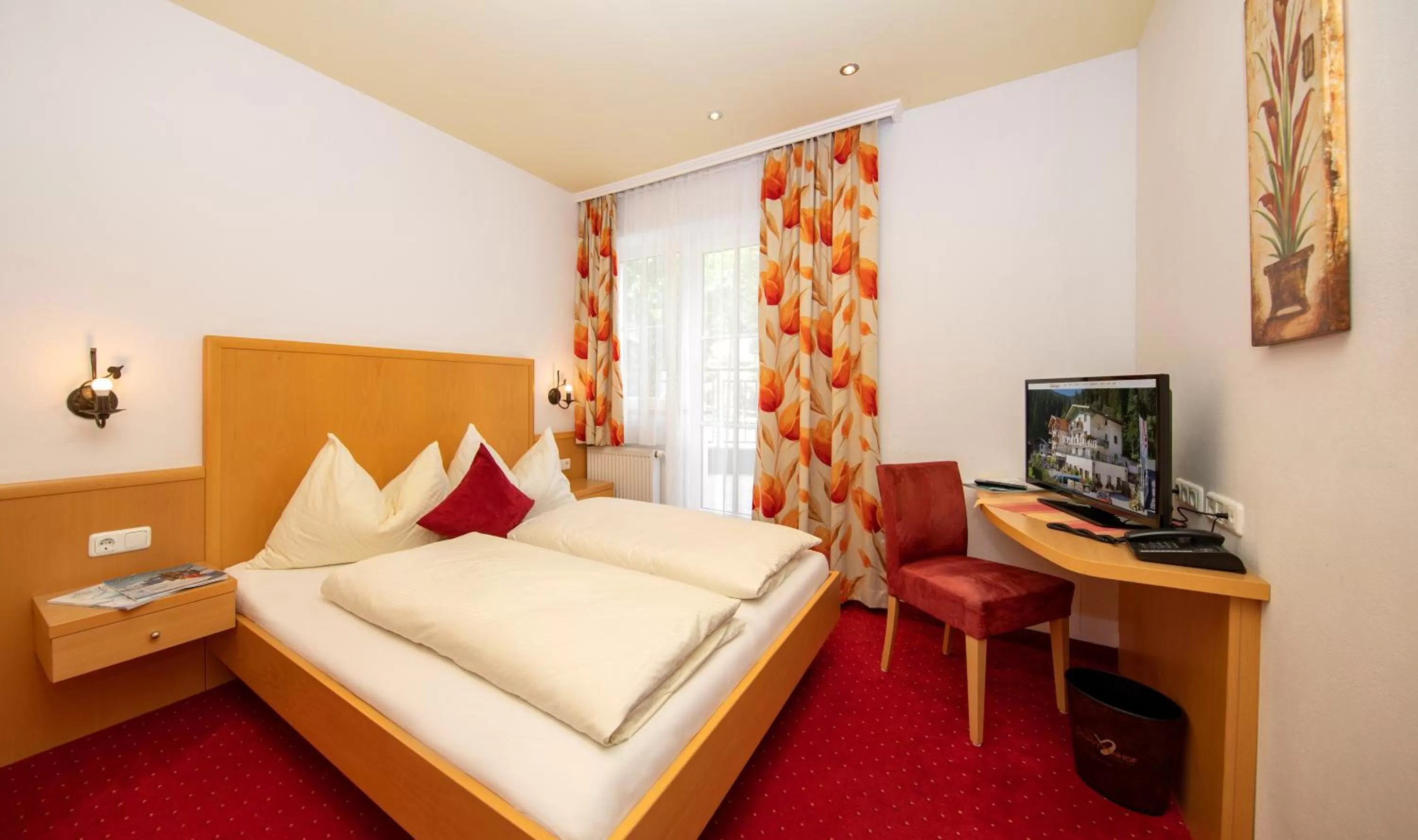 Photo of the whole room, Bed in Hotel Der Schmittenhof