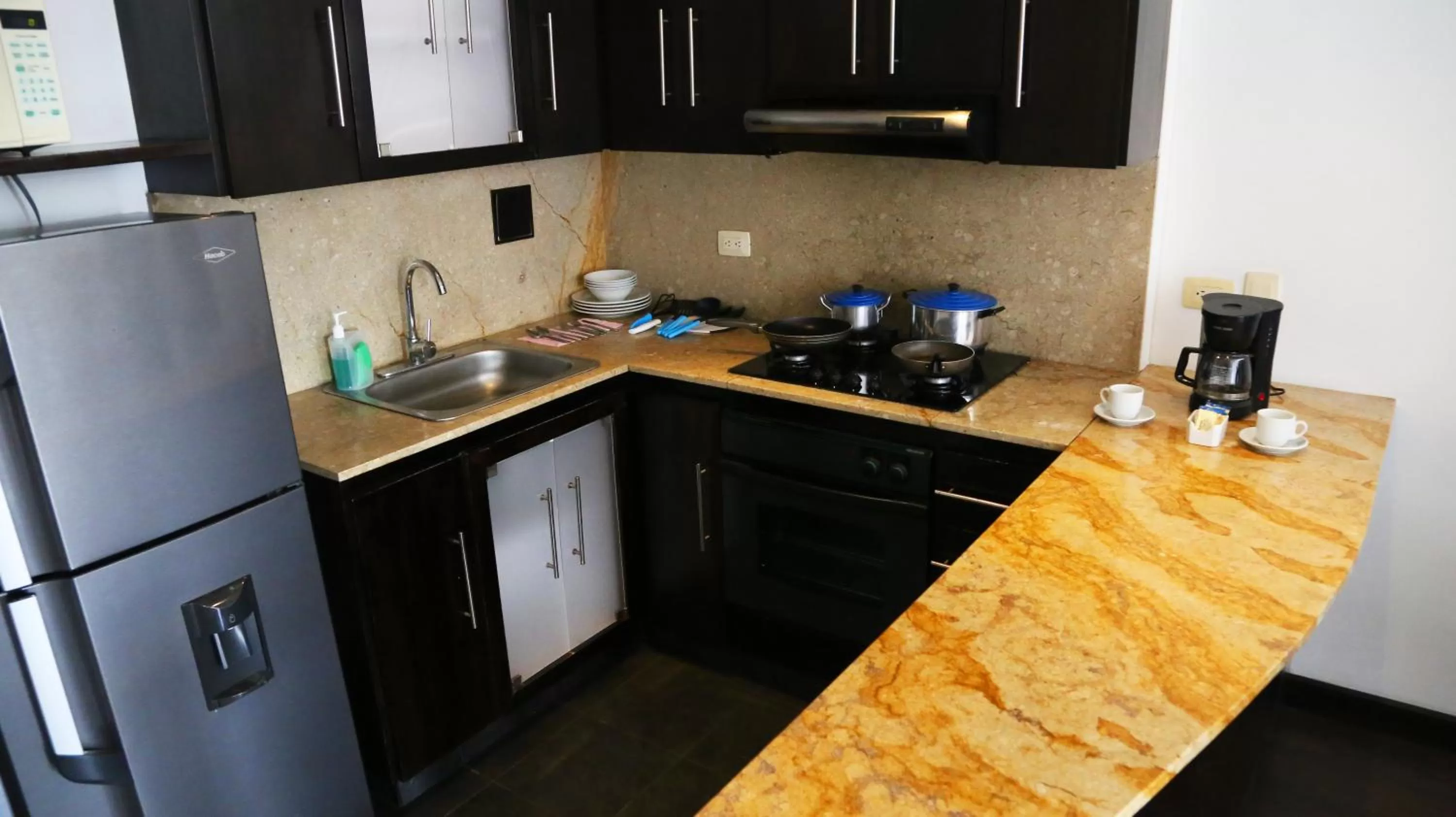 Kitchen or kitchenette in Hotel 104 Art Suites