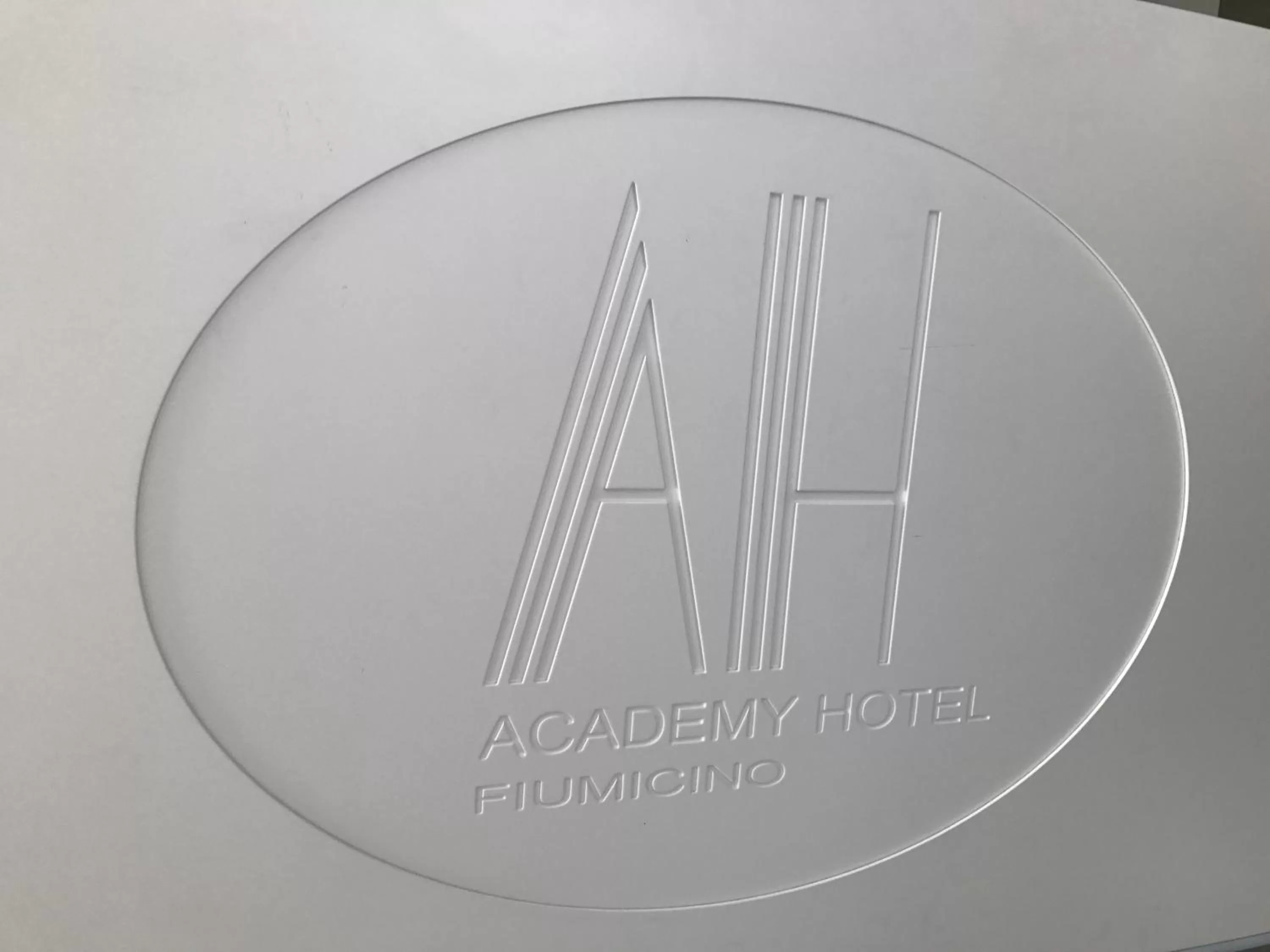 Property logo or sign in Academy Hotel