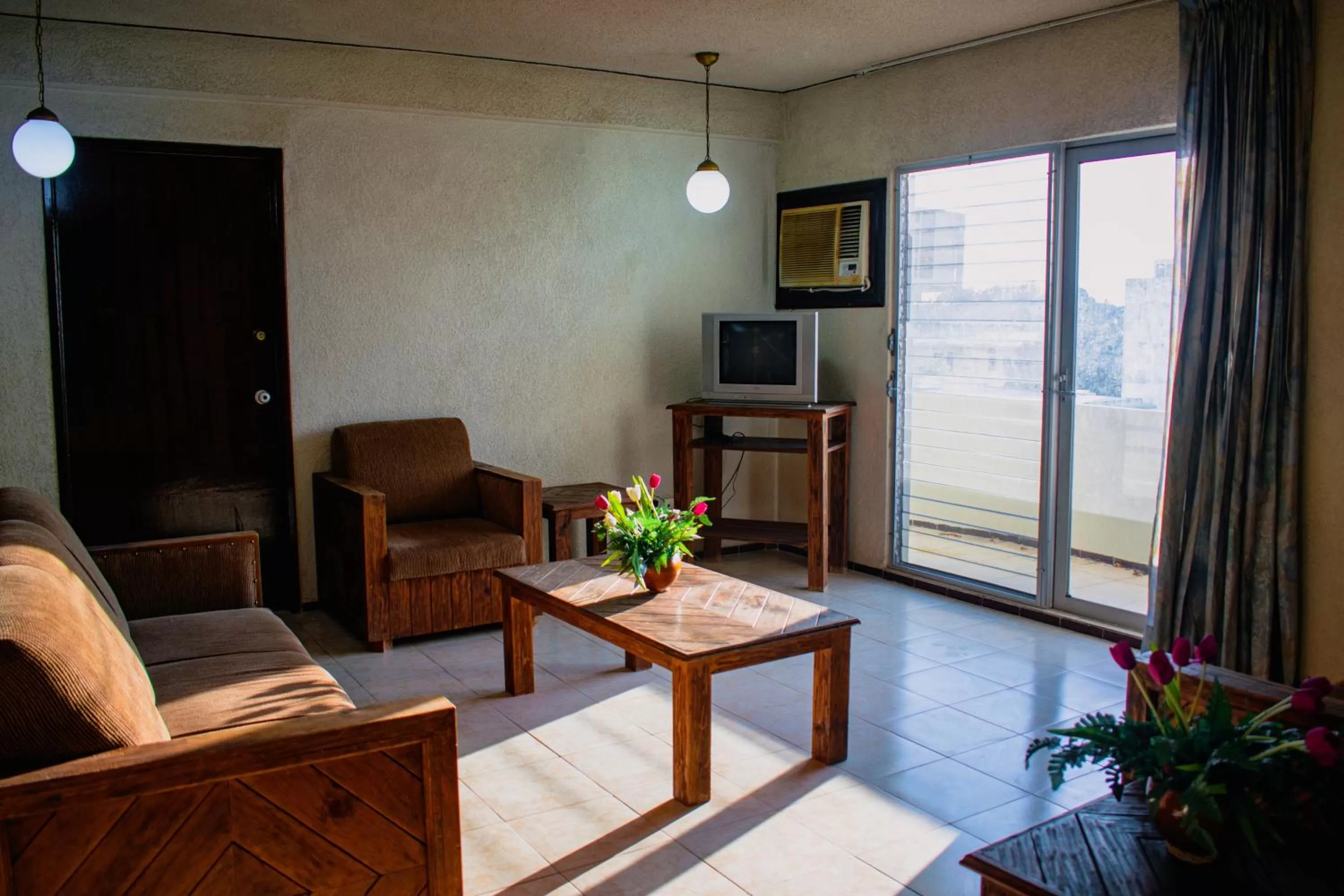 Living room, Seating Area in Suites Del Sol