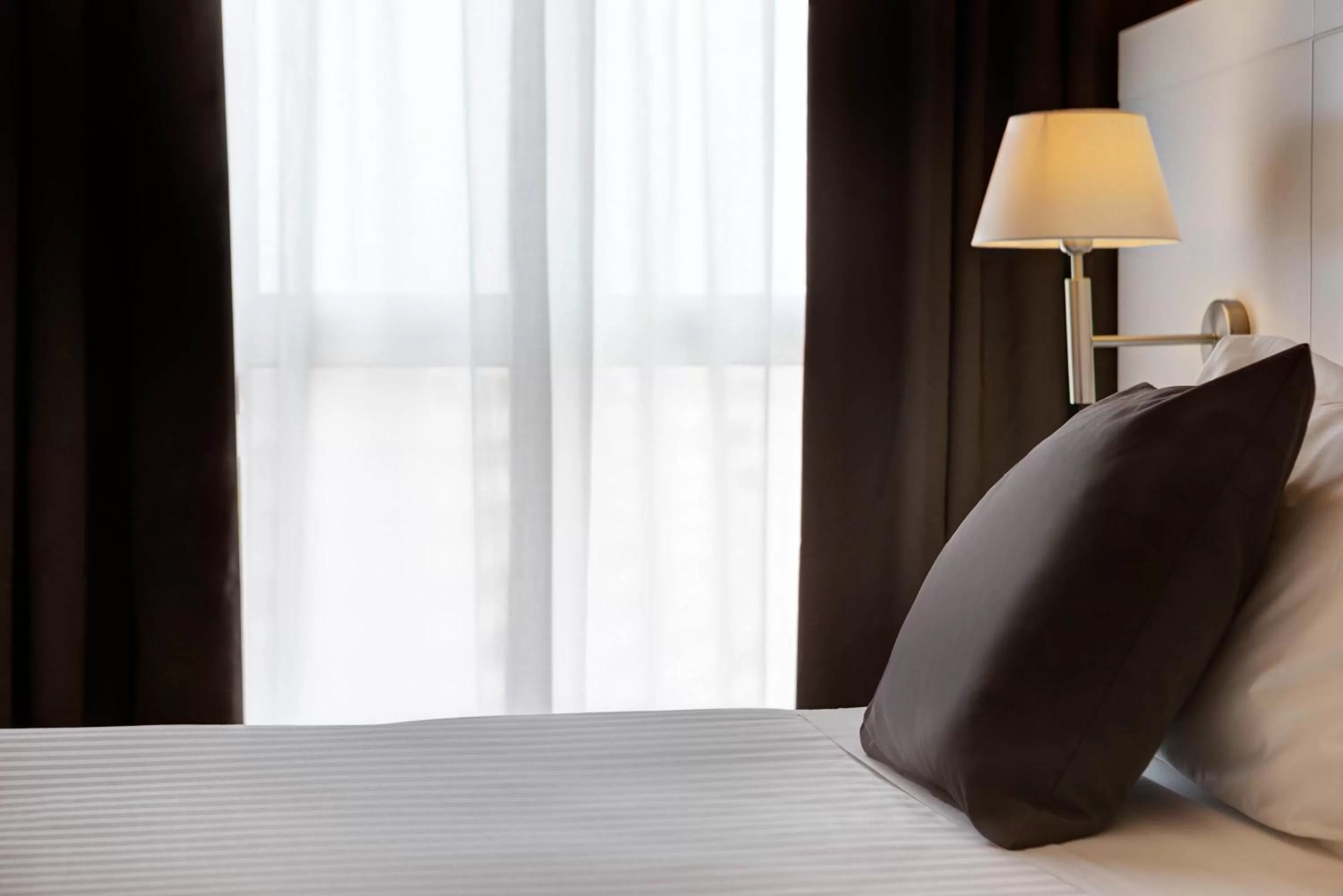 Decorative detail, Bed in iH Hotels Roma Z3