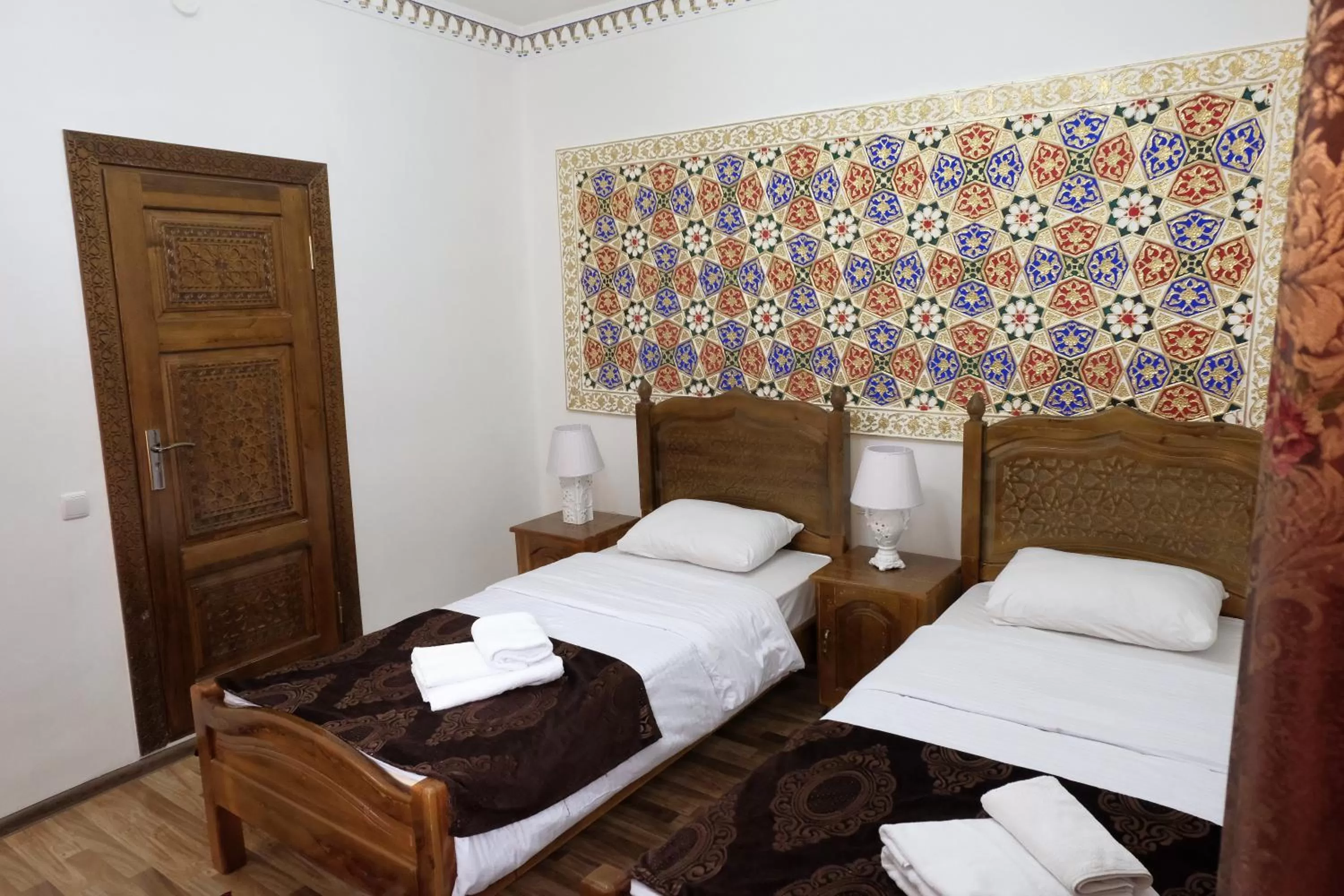 Bed in Bukhara Baraka Boutique Hotel