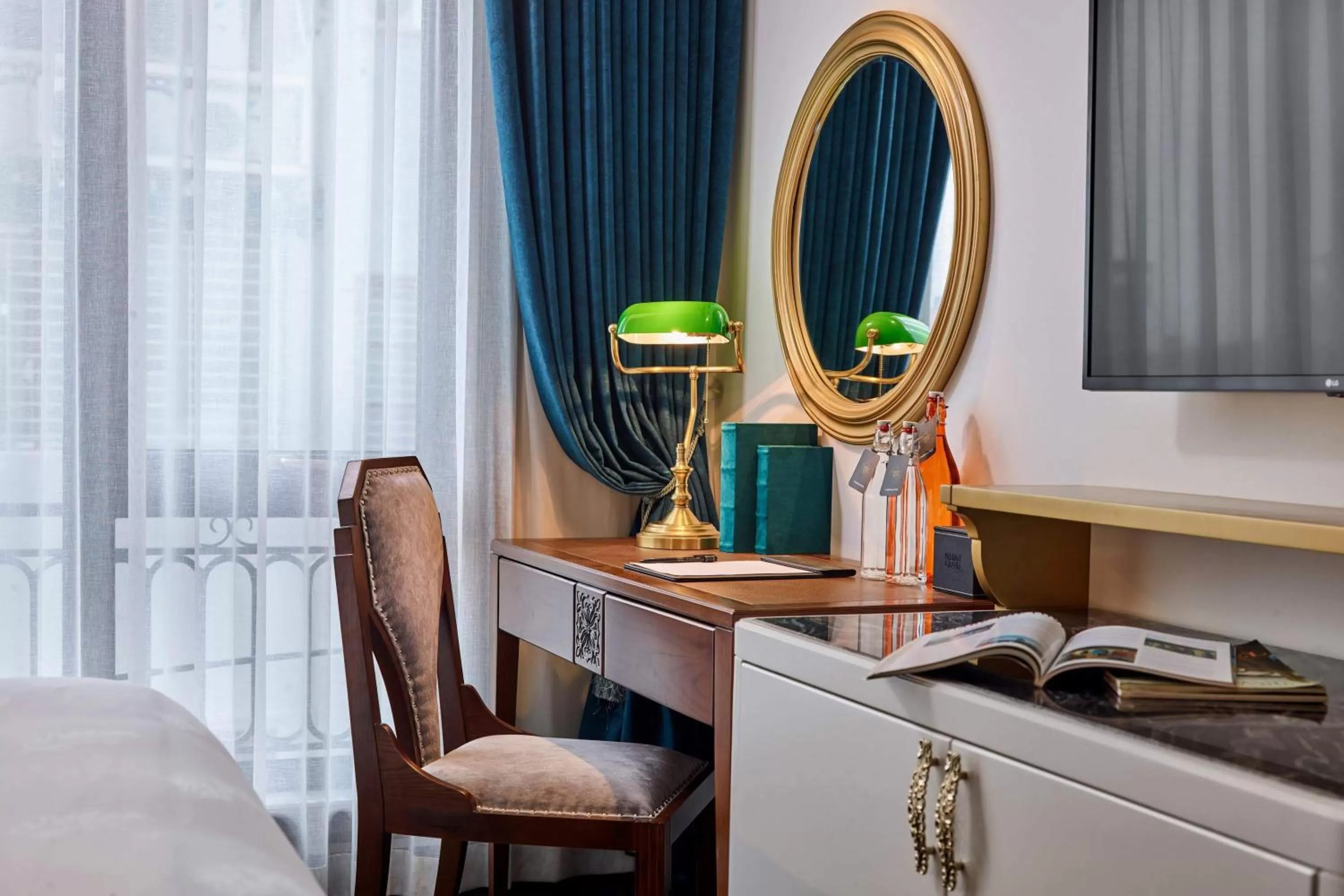 Seating area, Bed in Peridot Grand Luxury Boutique Hotel