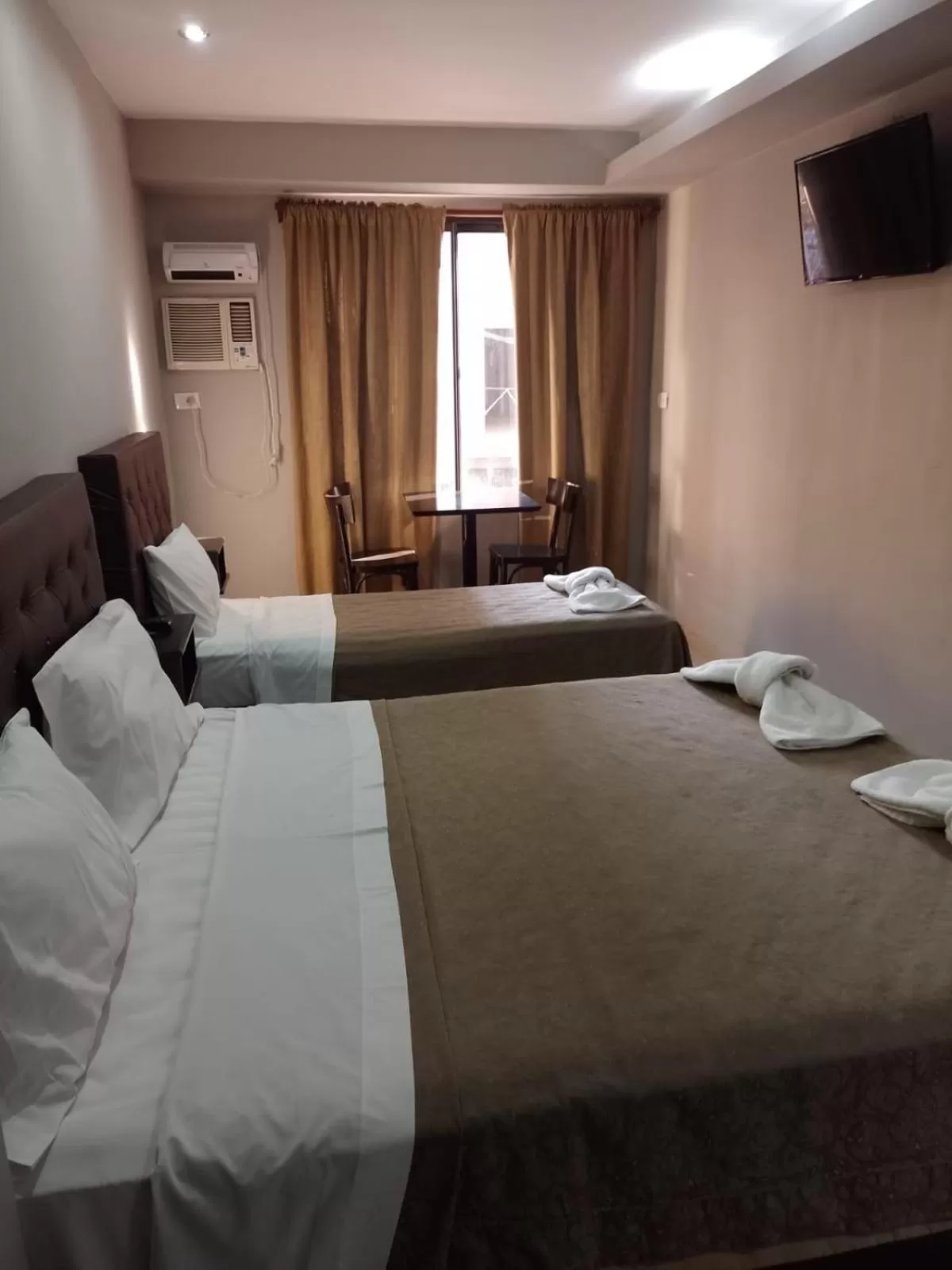 Bed in Lorenzo Suites Hotel