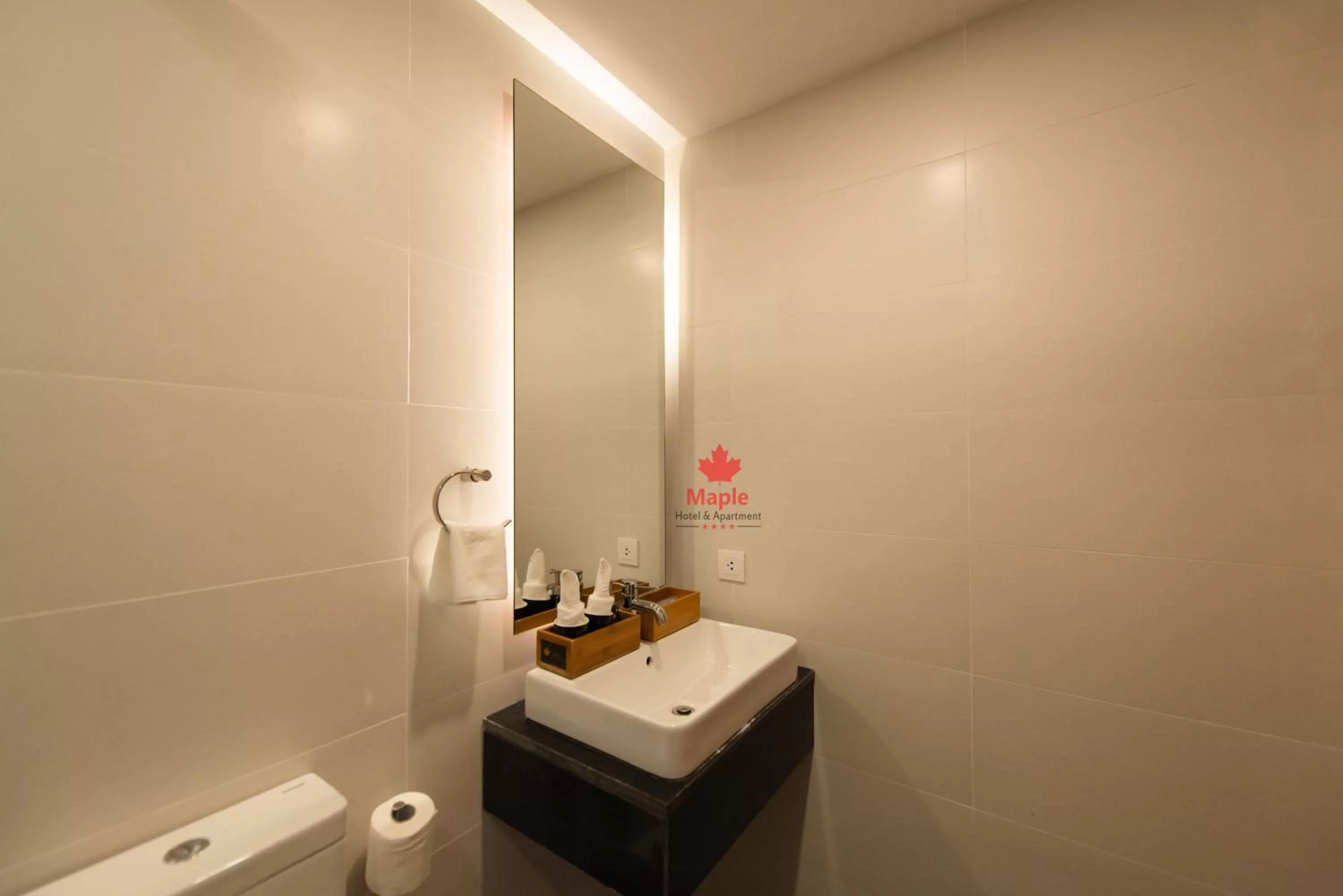 Toilet in Maple Hotel & Apartment