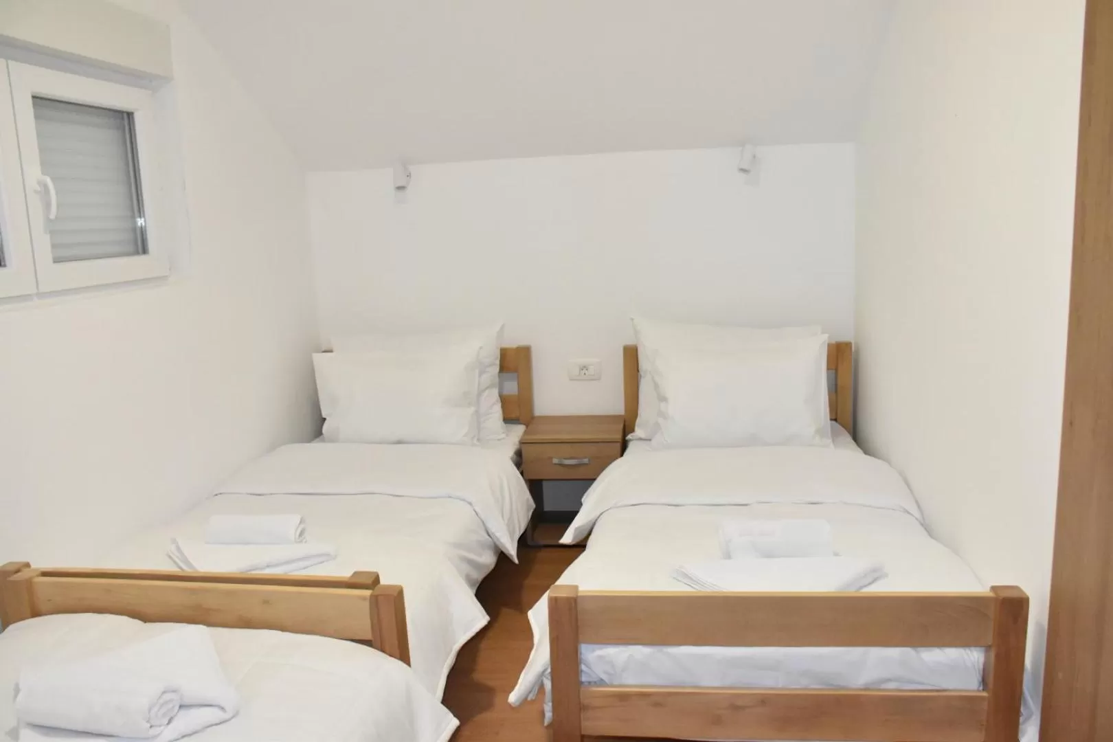 Bed in OSTROG Aparthotel KOLIBA-VLASTNIŠTVO MANASTIRA OSTROG