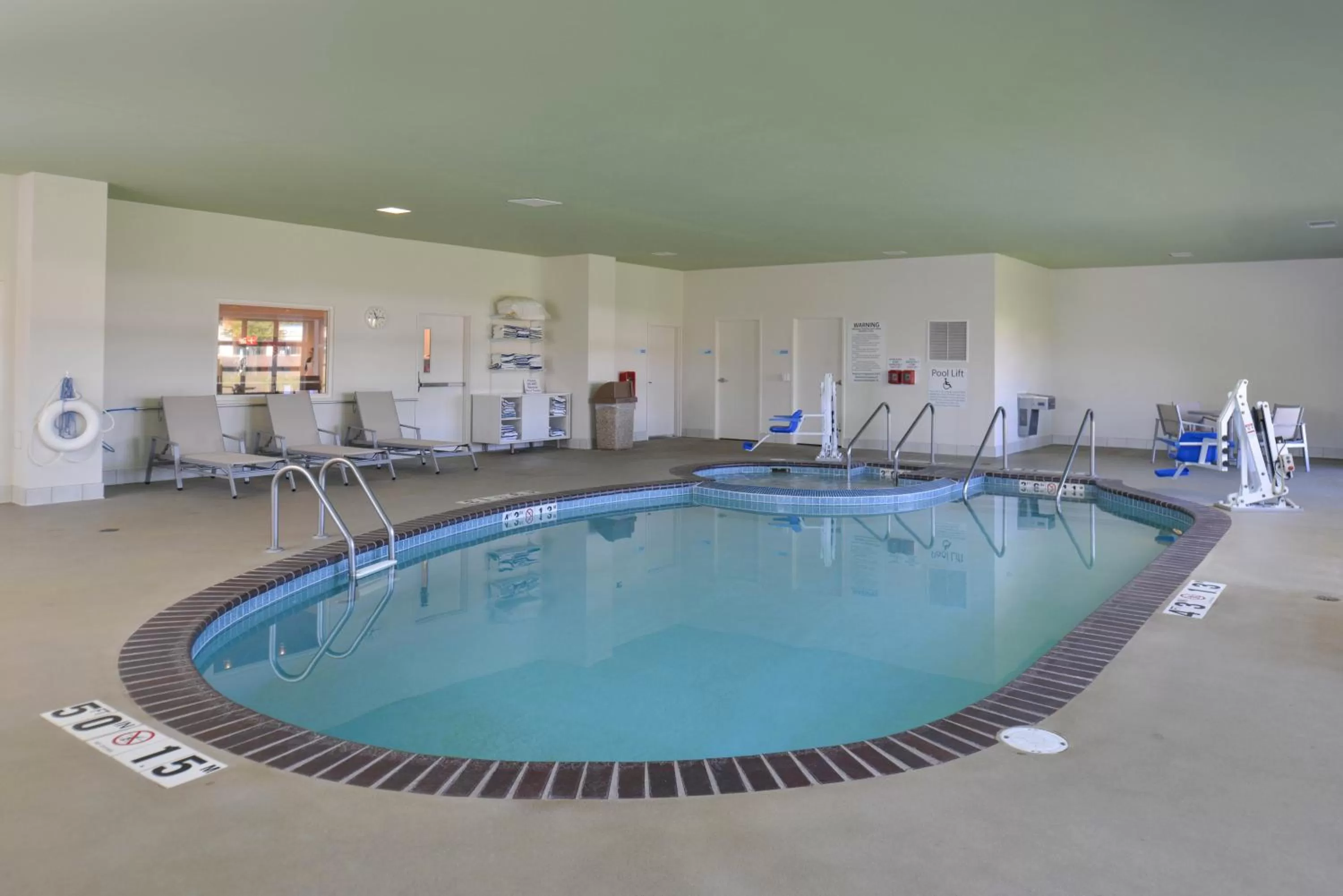 Swimming pool in Holiday Inn Express Hotel and Suites Stevens Point by IHG