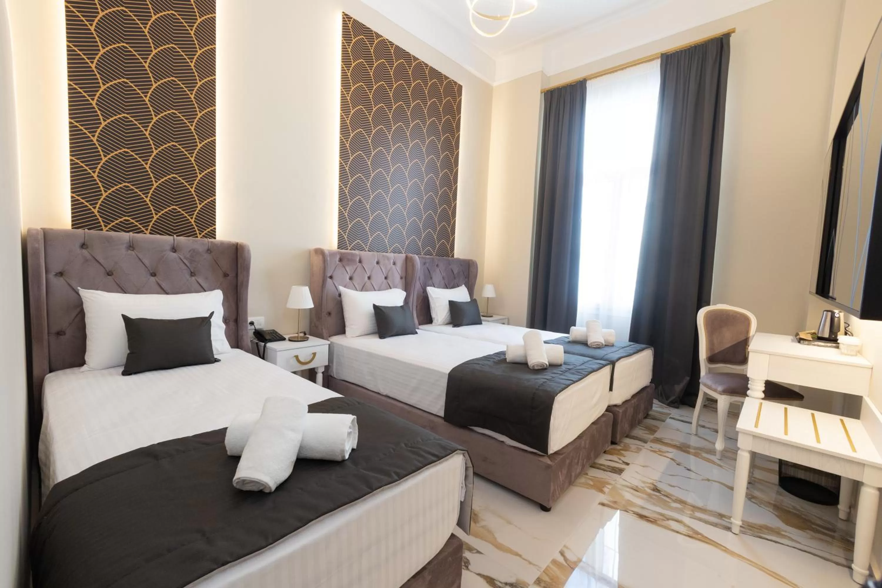 Bed in Modern Revival Luxury Hotel