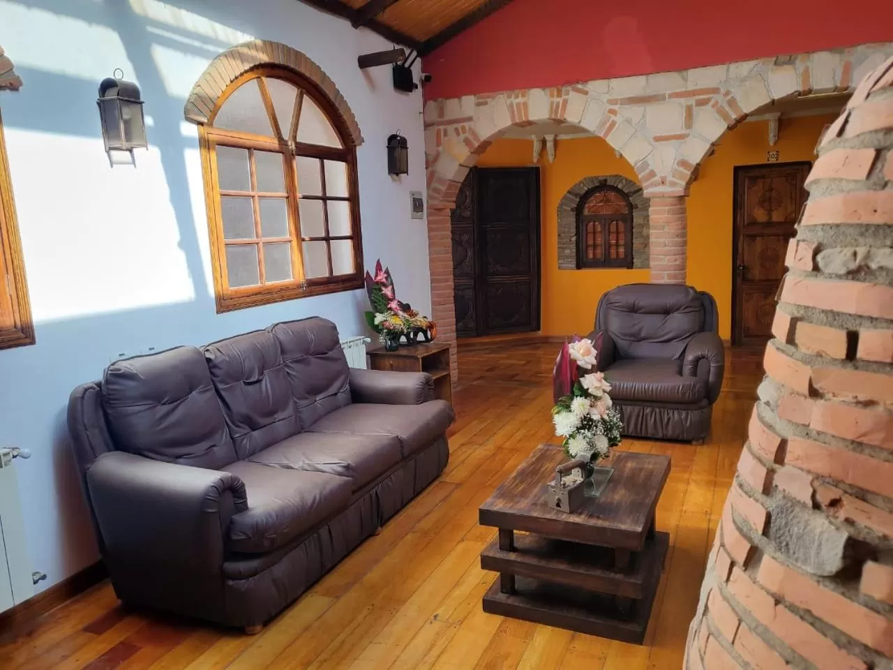 Communal lounge/ TV room in Patio de Piedra Hotel Boutique