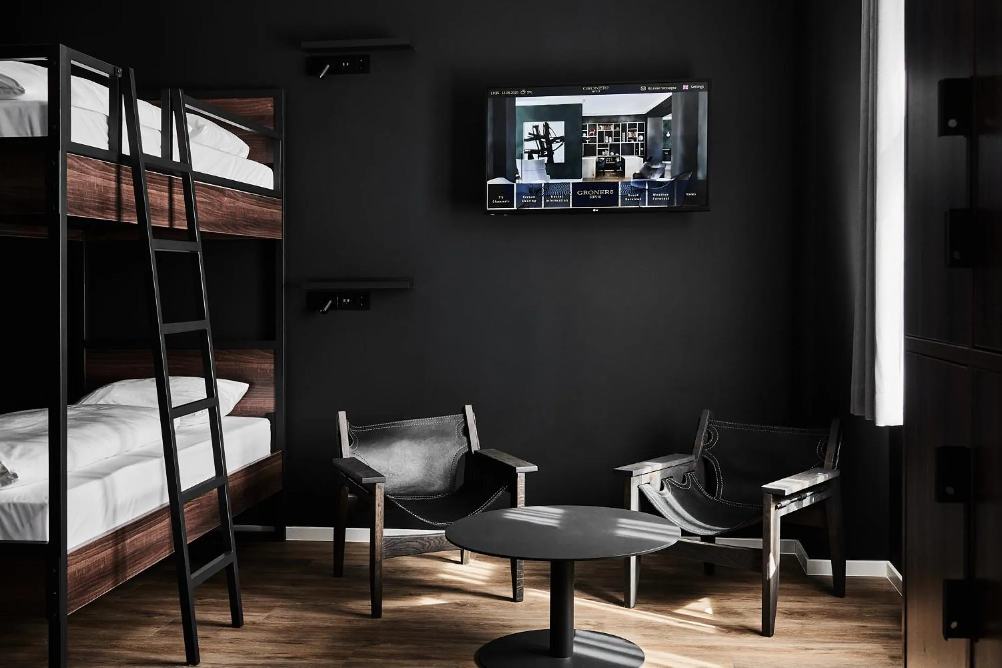 Seating area, Bed in GRONERS Leipzig City Center