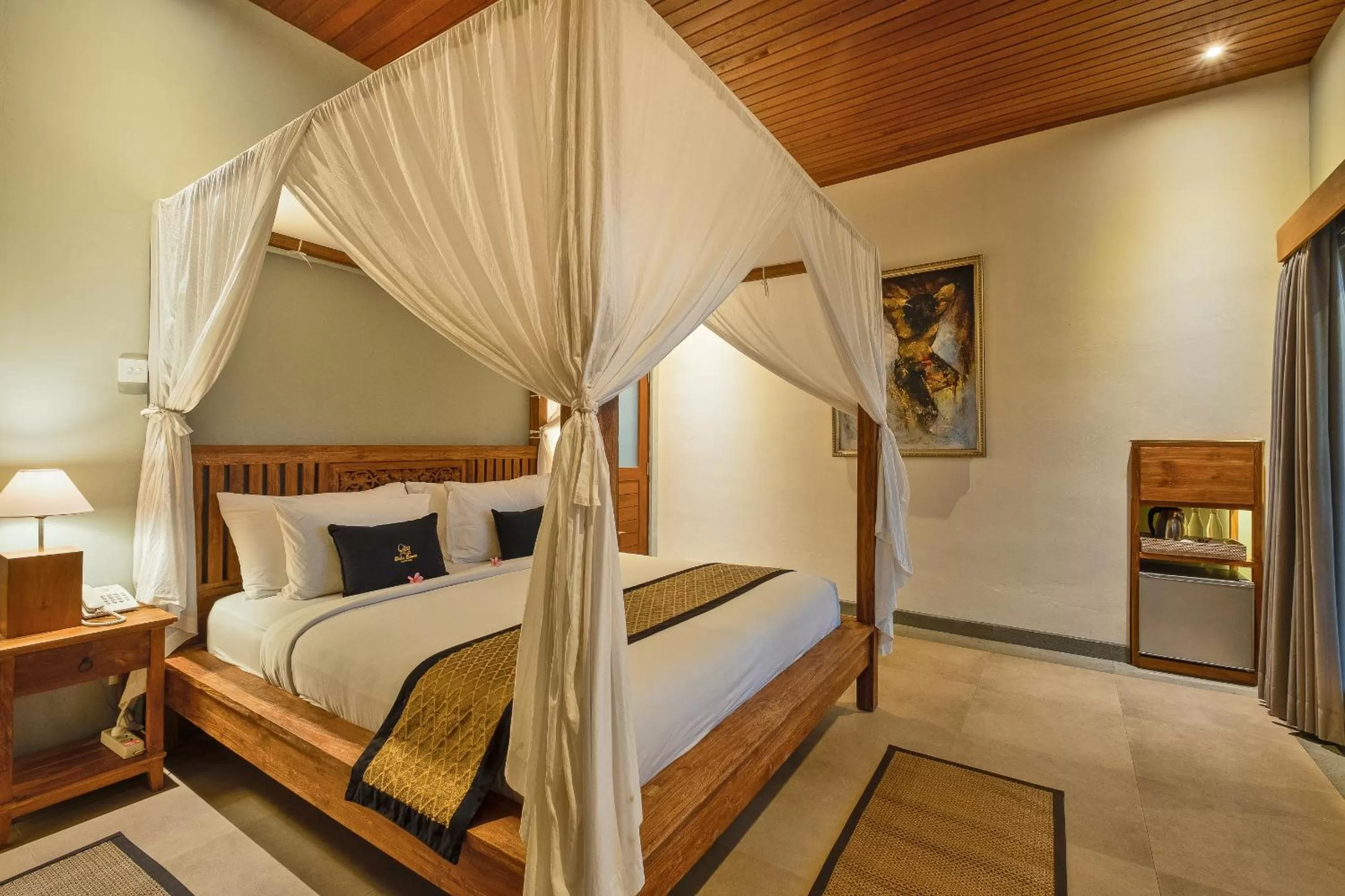 Bed in Kubu Rama Ubud Cottage