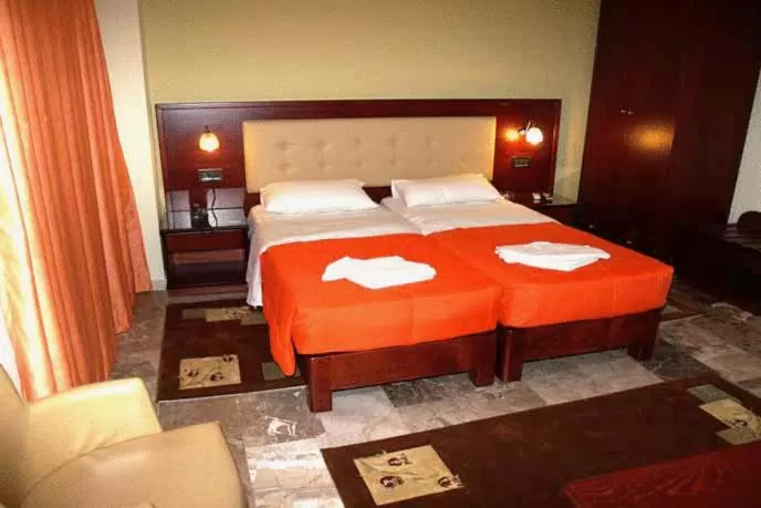 Bed in Hotel Filoxenia