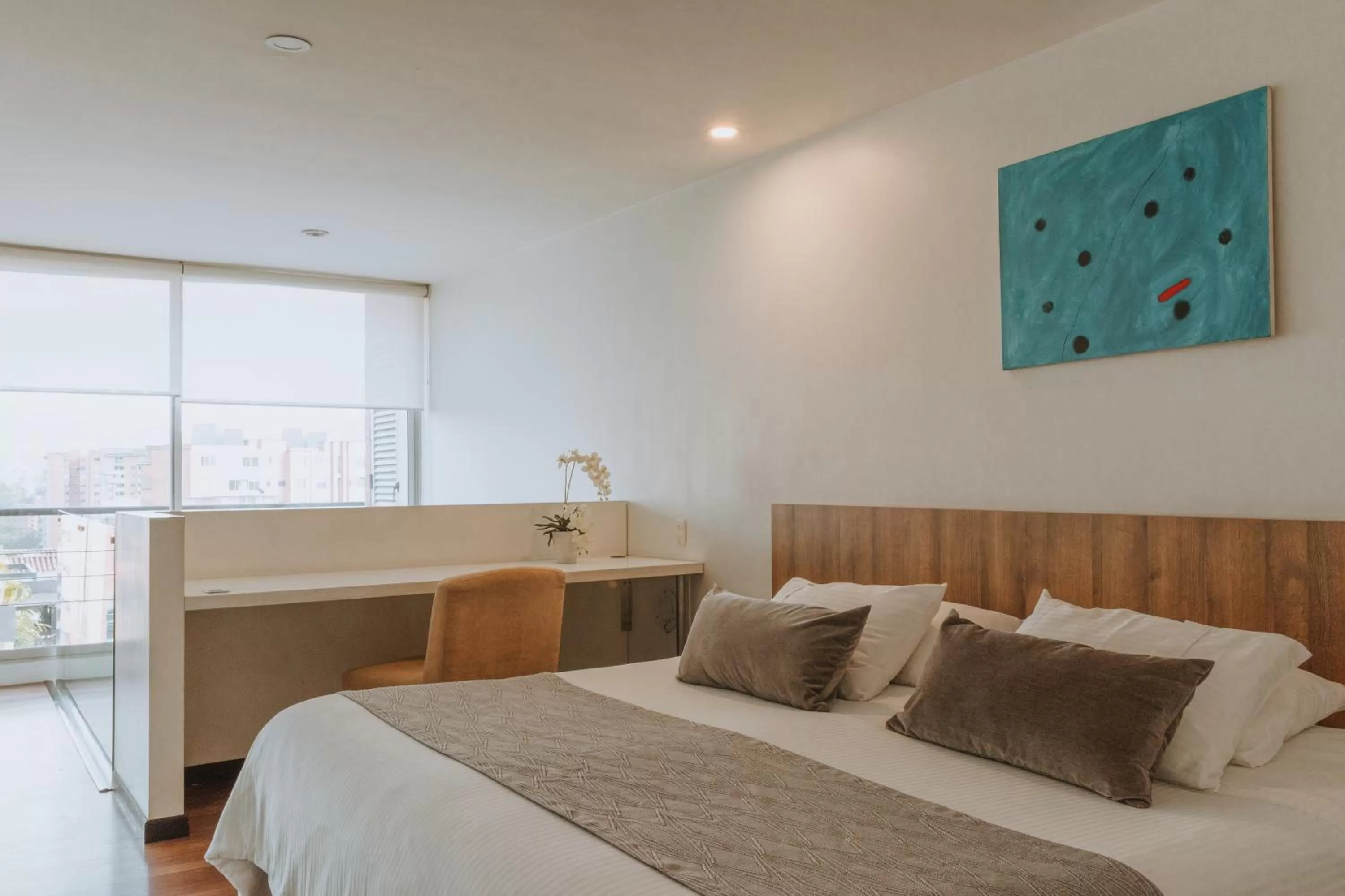 Photo of the whole room, Bed in Travelers Orange Suites