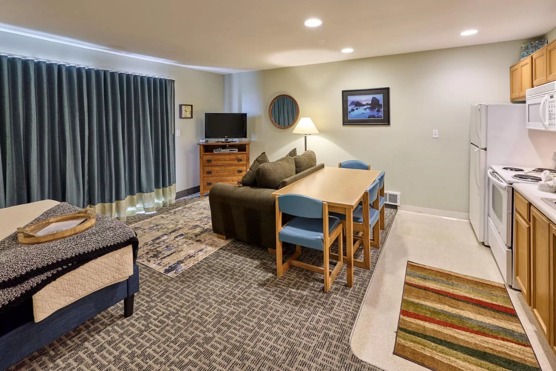 Bed, Seating Area in D Sands Rentals