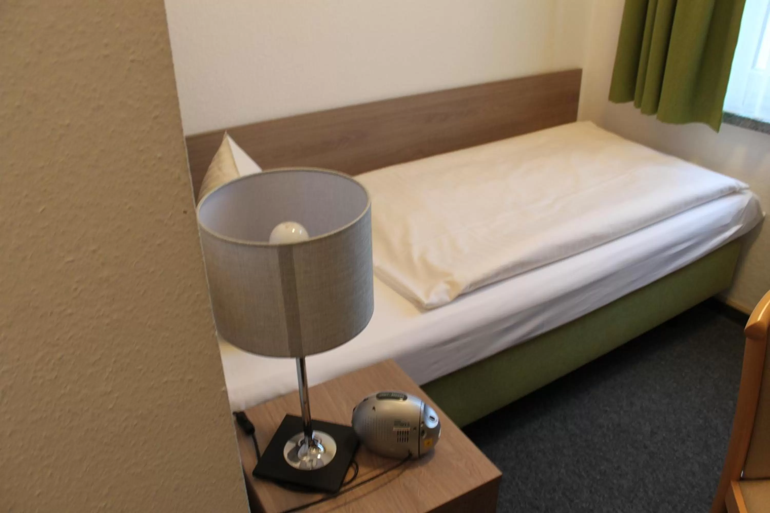 Bed in Hotel Sächsischer Hof