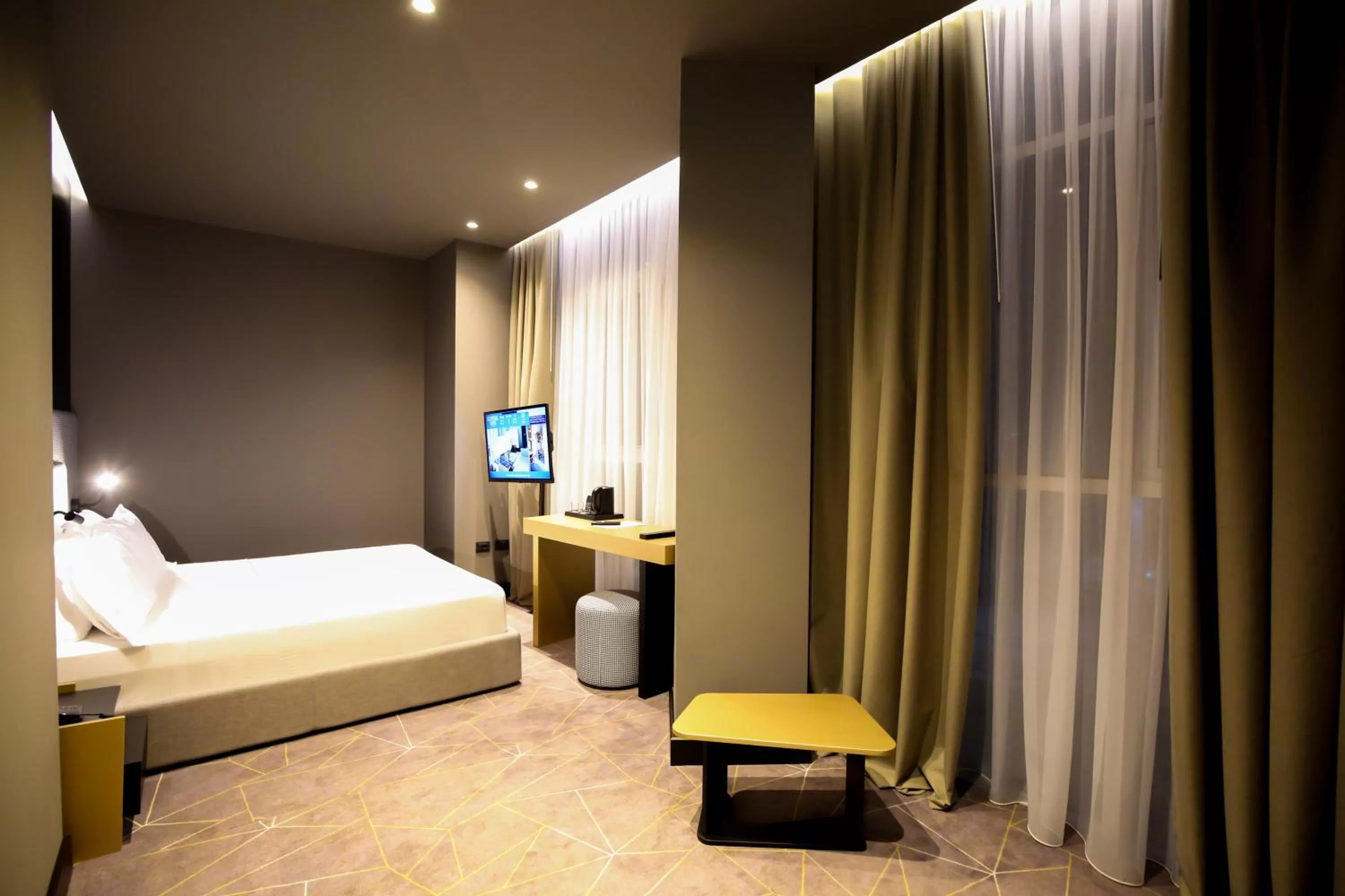 Bed in The Central View Boutique Hotel