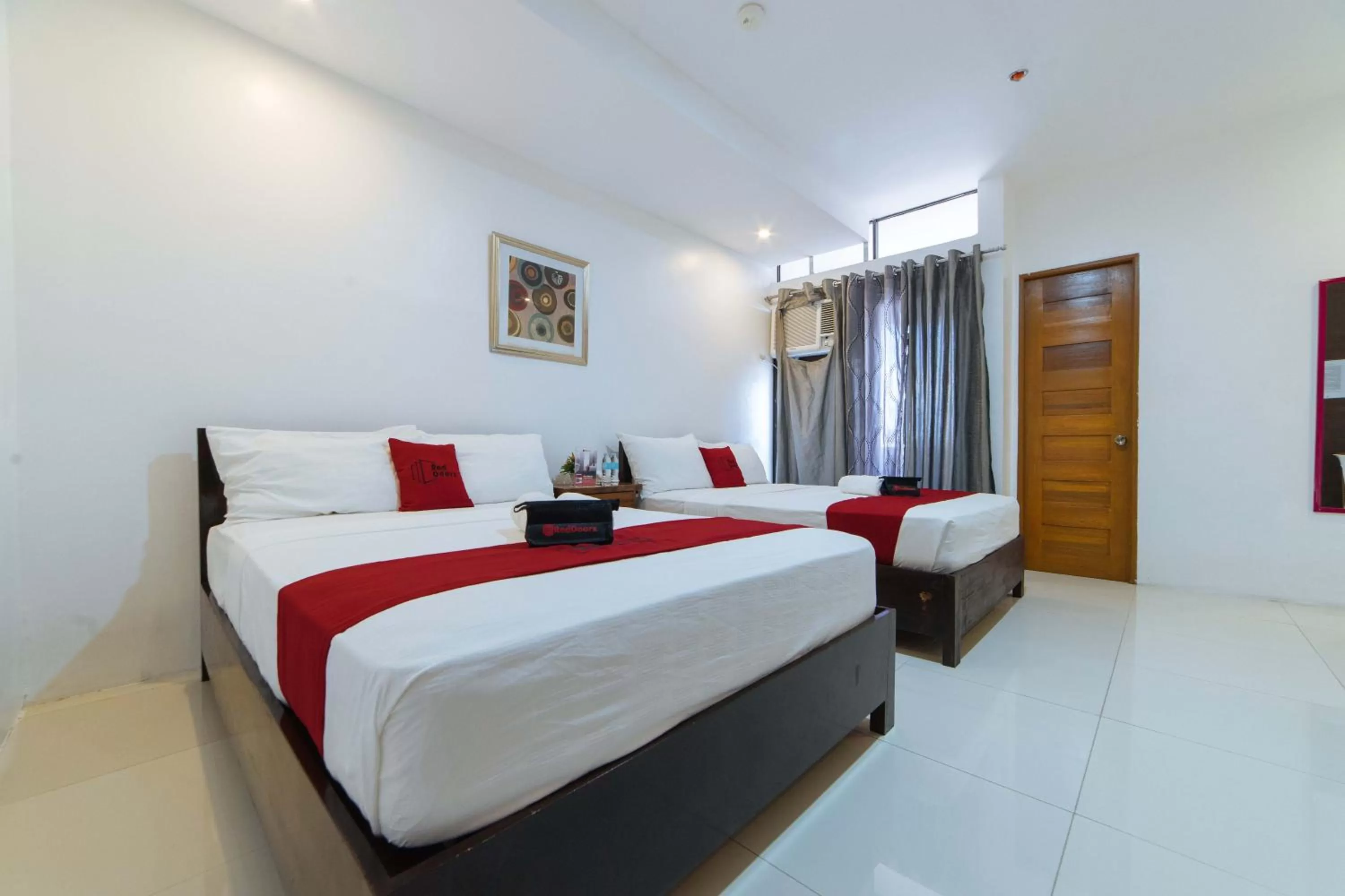 Photo of the whole room, Bed in RedDoorz Plus @ San Roque Roxas City