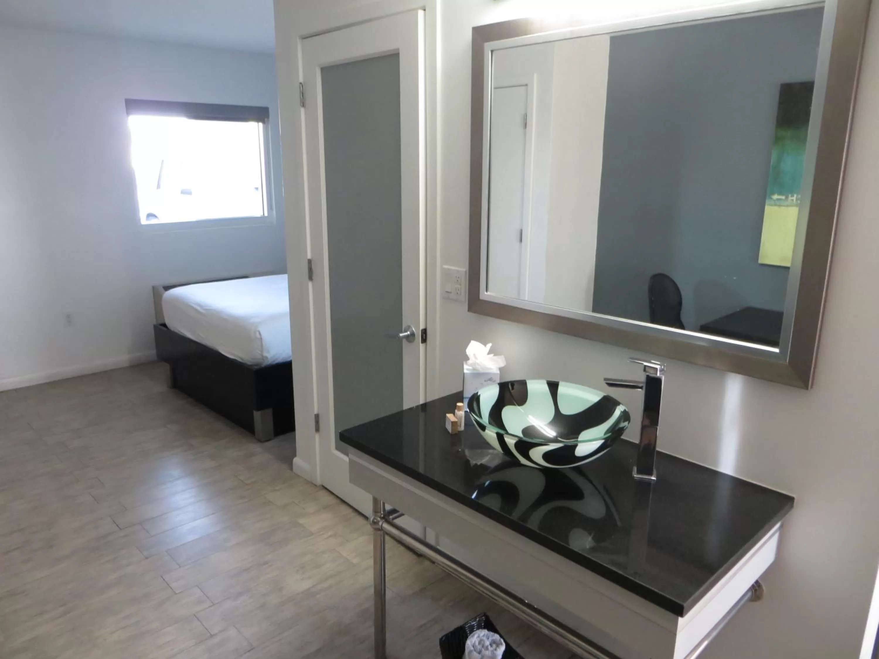 Decorative detail, Bed in Lotus Boutique Inn and Suites