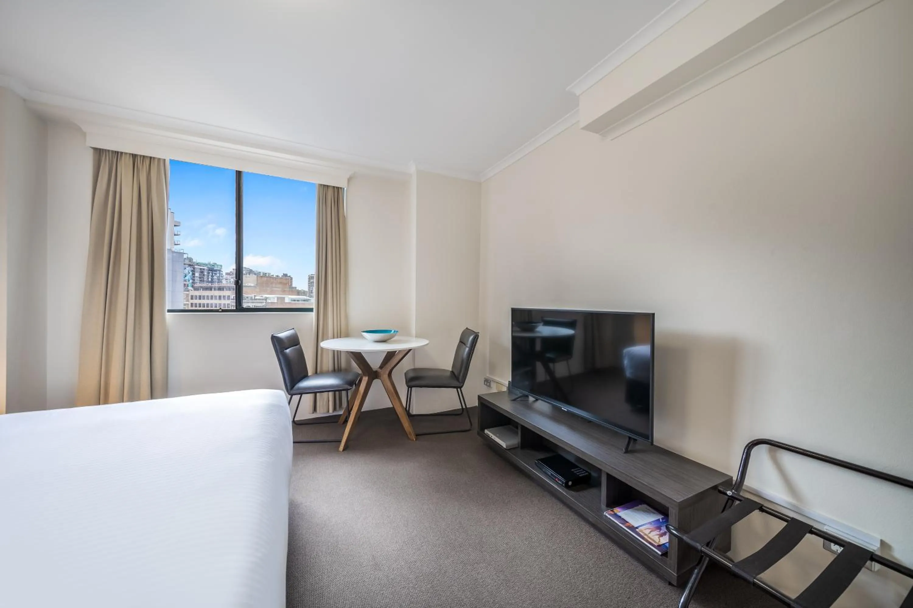 Bed in Oaks Sydney Castlereagh Suites