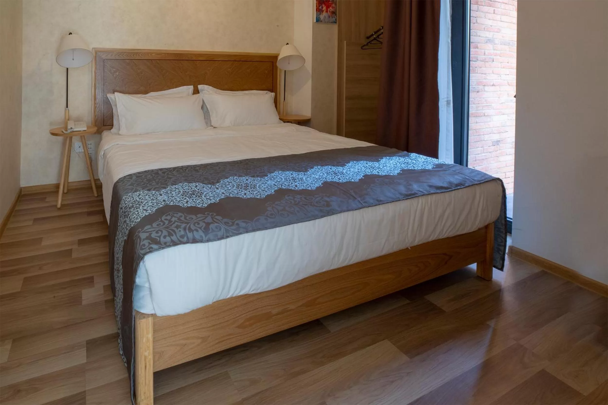 Bed in Ornament Boutique Hotel