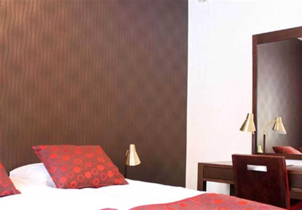 Bed in Art Hotel Honkahovi