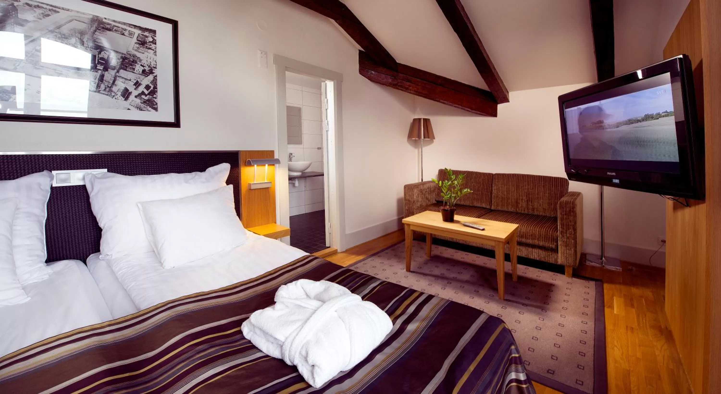 Bed in Home Hotel Bilan