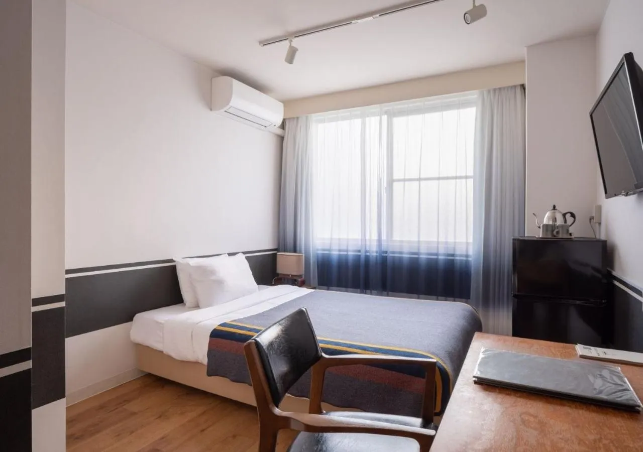 Photo of the whole room, Bed in Hotel Graphy Nezu