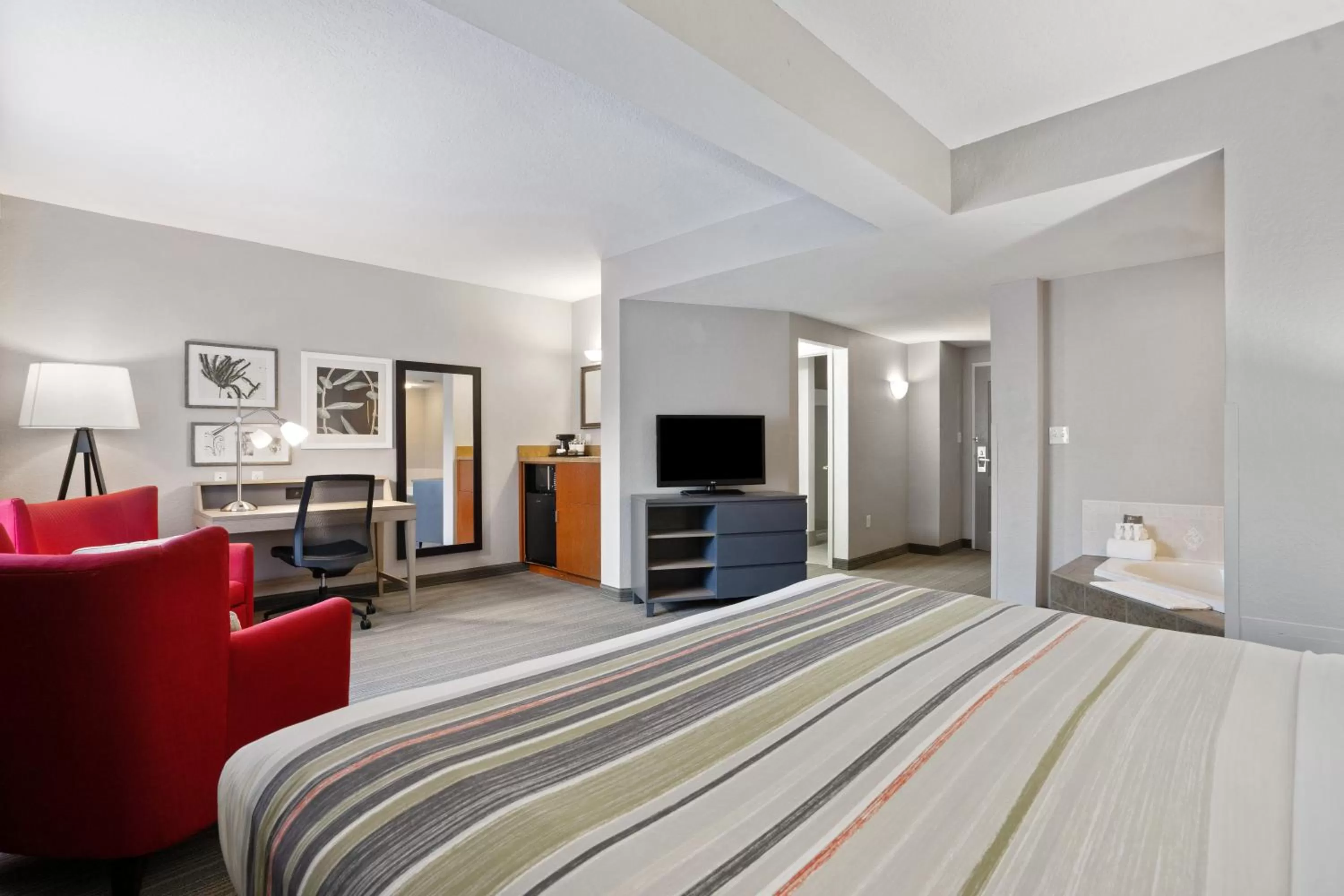 Photo of the whole room, Bed in Country Inn & Suites by Radisson, Port Canaveral, FL