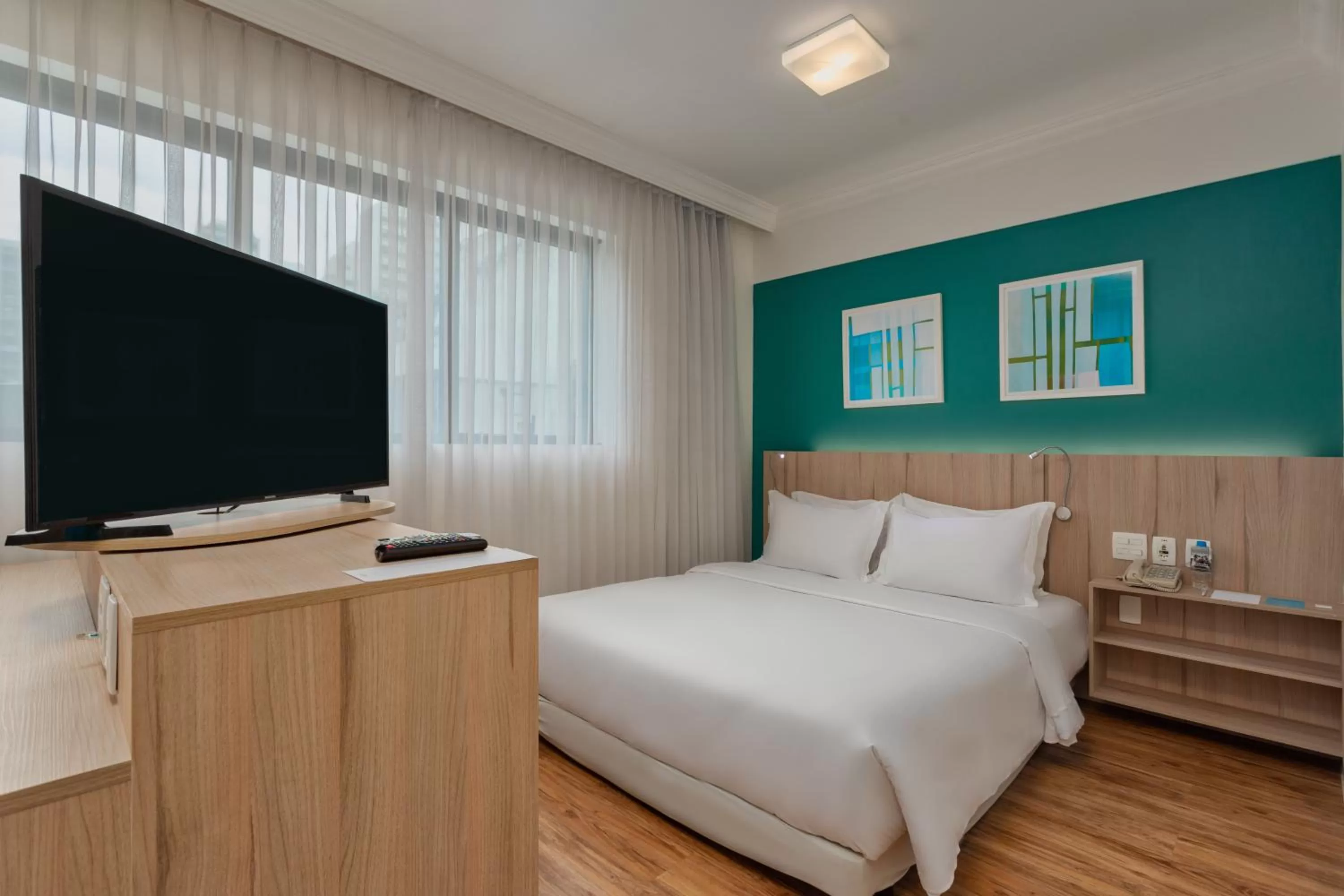 Bed in Radisson Oscar Freire