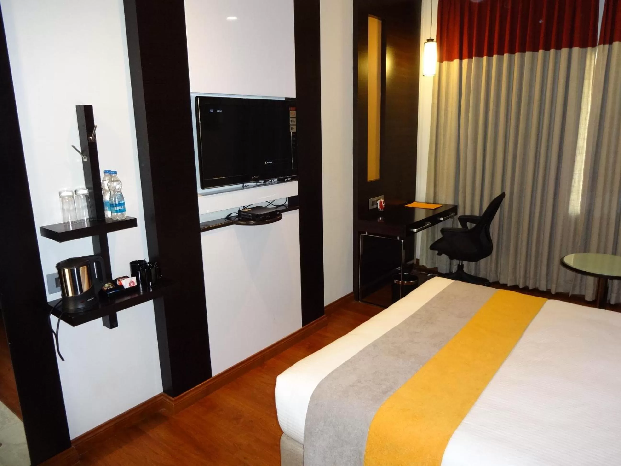 TV and multimedia, Bed in Astoria Hotels Madurai