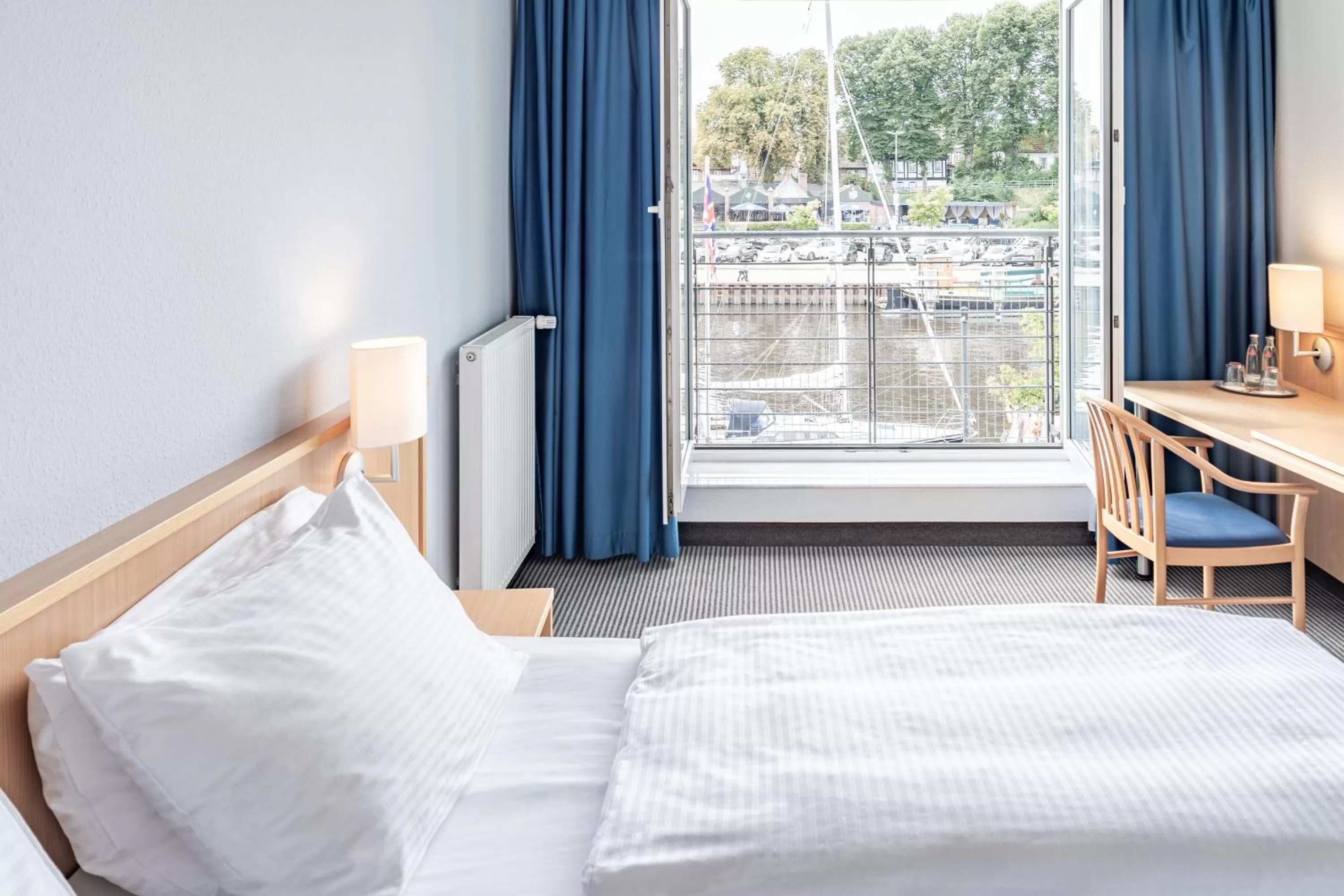 Photo of the whole room, Bed in Hotel Stadthafen Stade