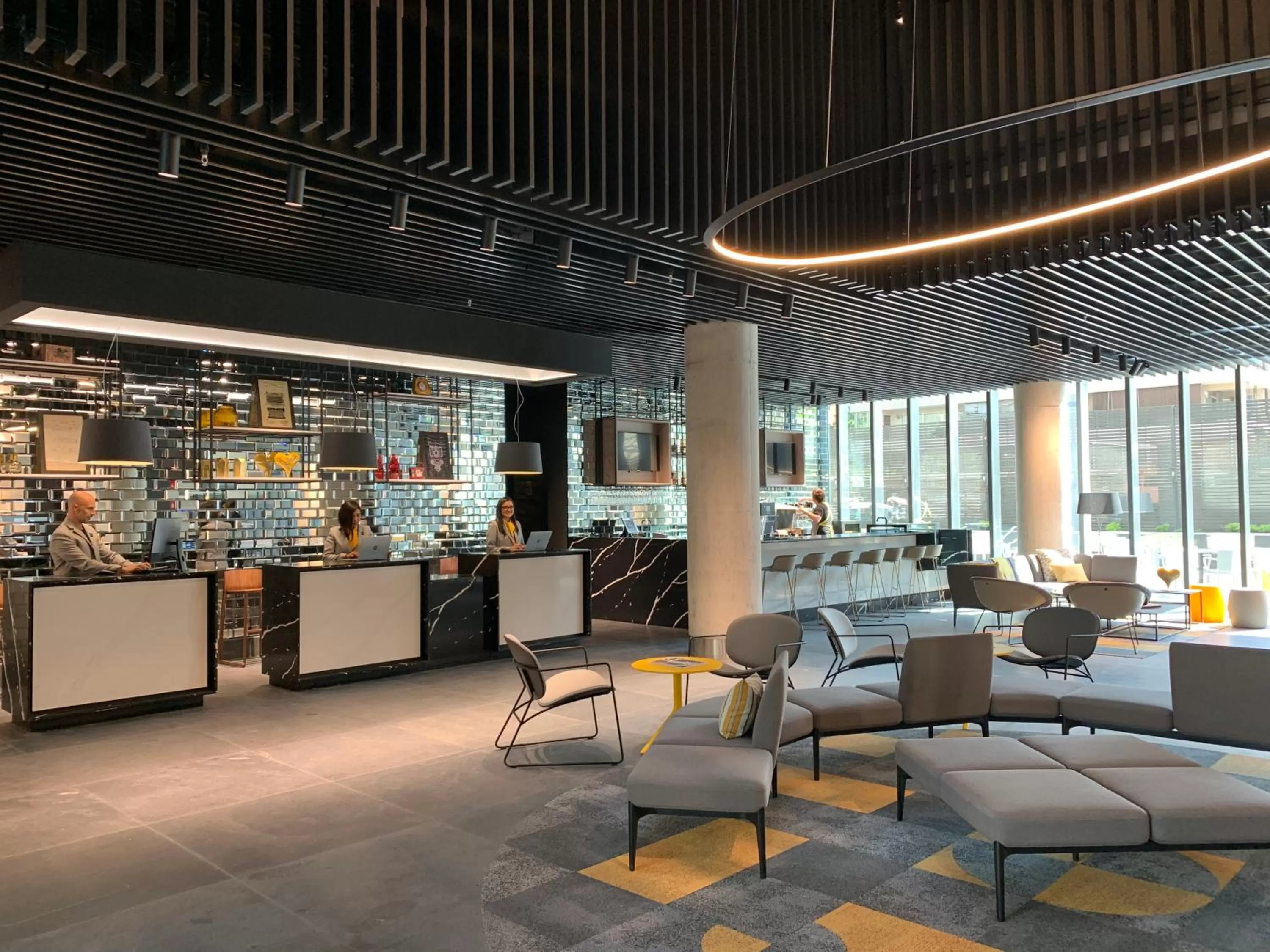 Communal lounge/ TV room in Ola Santiago Providencia, Tapestry Collection by Hilton