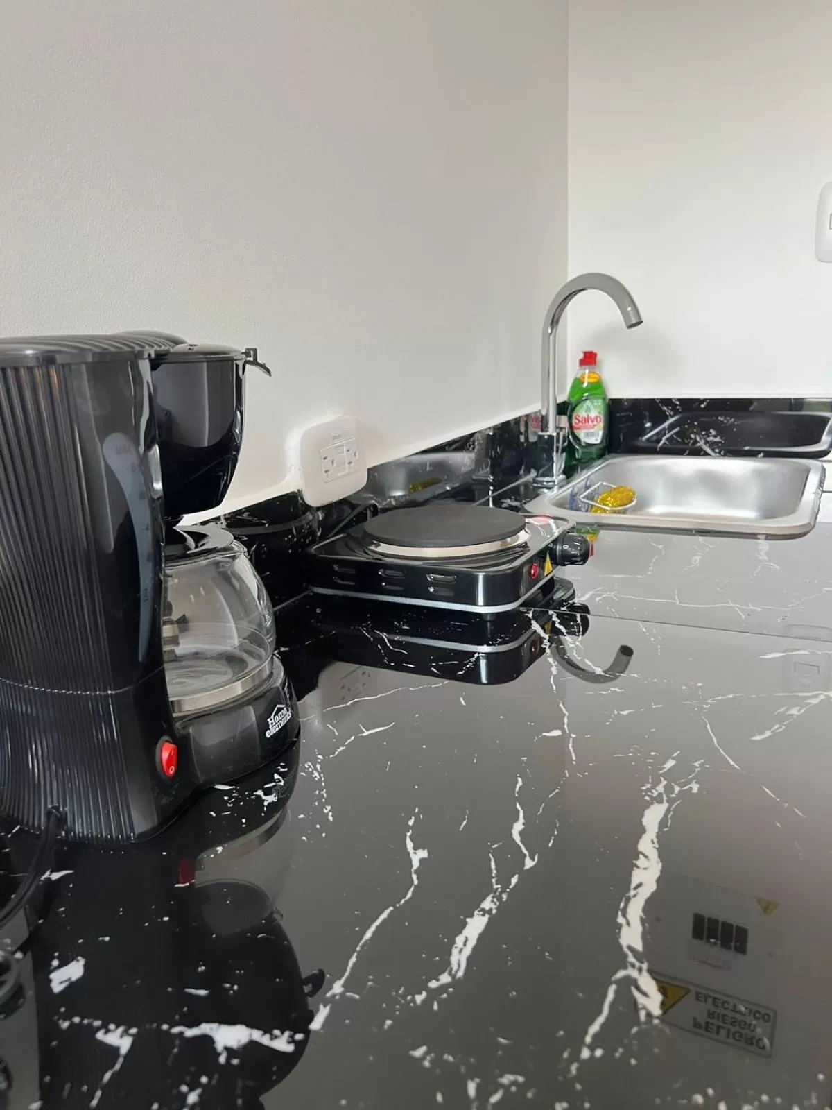 Kitchen or kitchenette in Hotel boutique bussines center