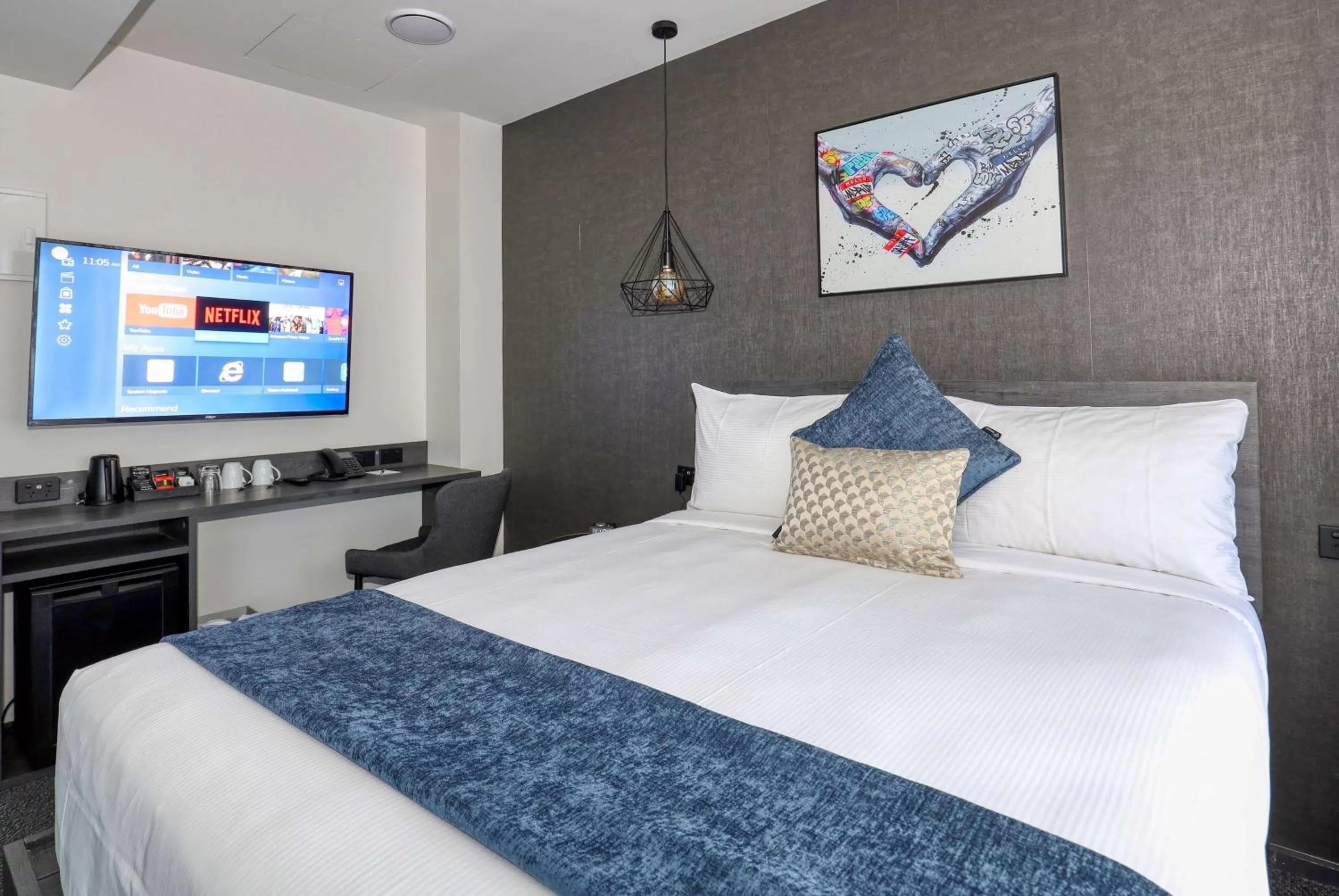 Photo of the whole room, Bed in Microtel by Wyndham Wellington