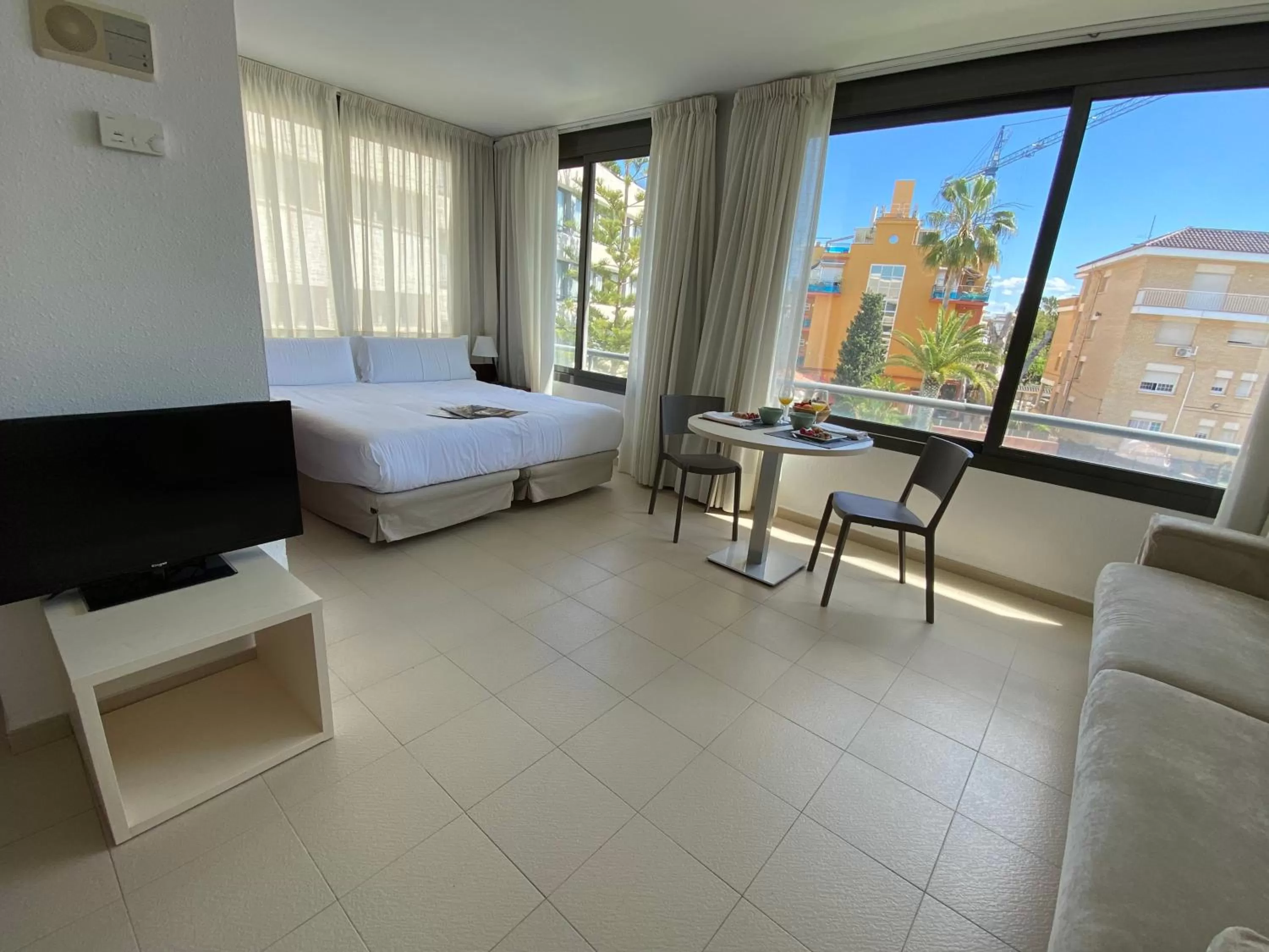 Living room, Bed in Atenea Park Suites & Apartments