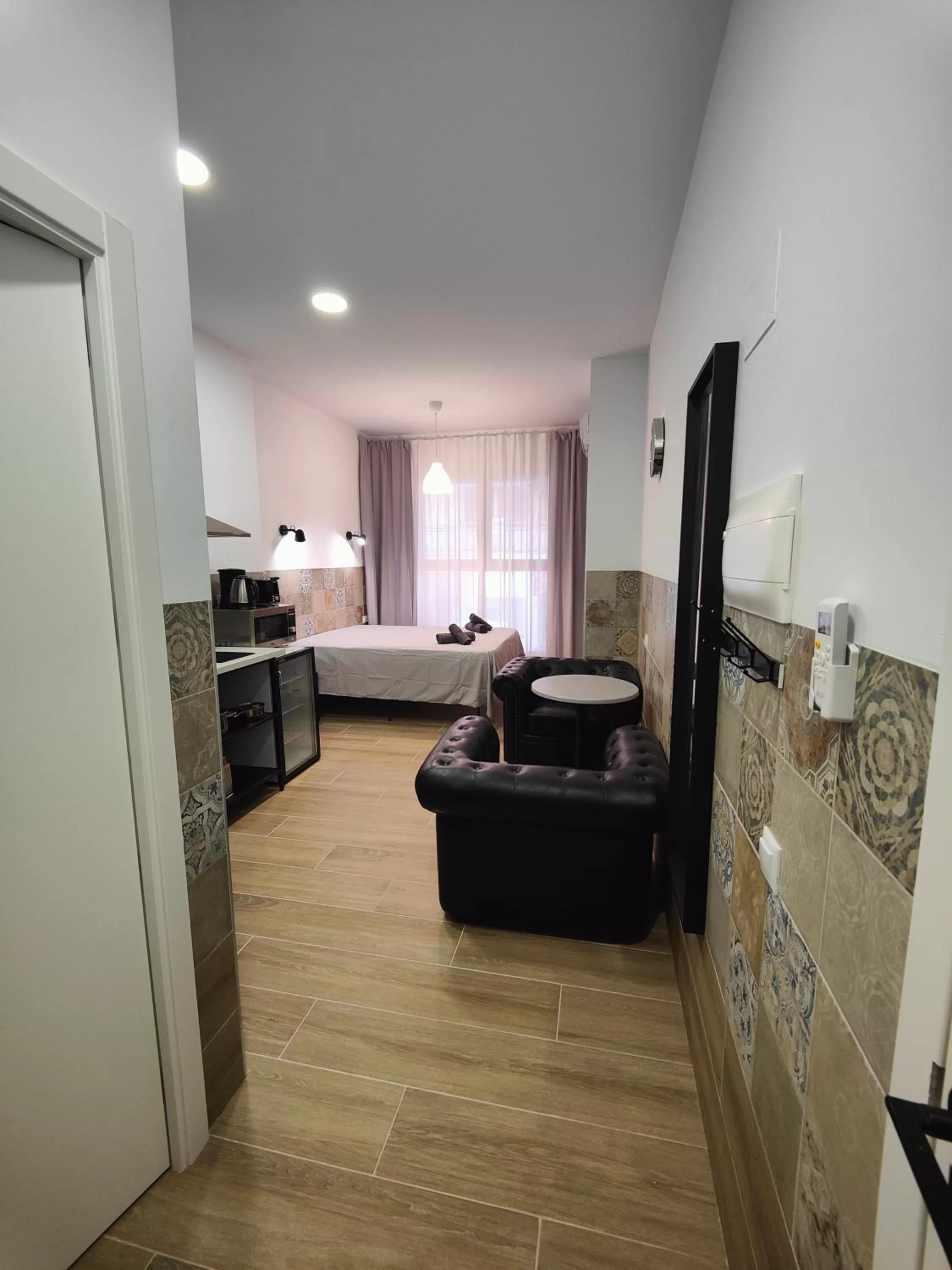 Seating area, Bed in Hotel Apartamentos Pueblo Mar