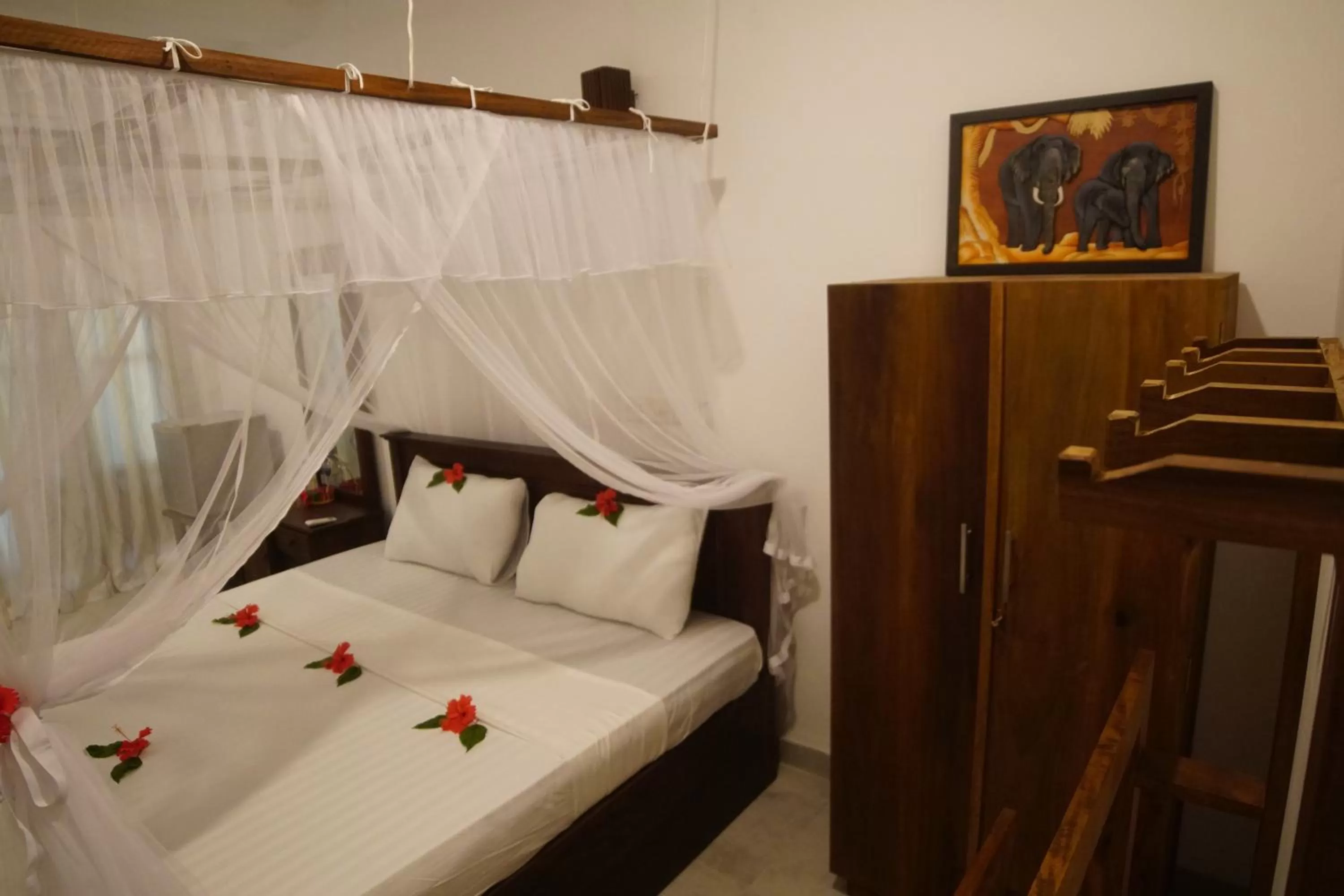 Bed in Turtle Bay Beach Resort