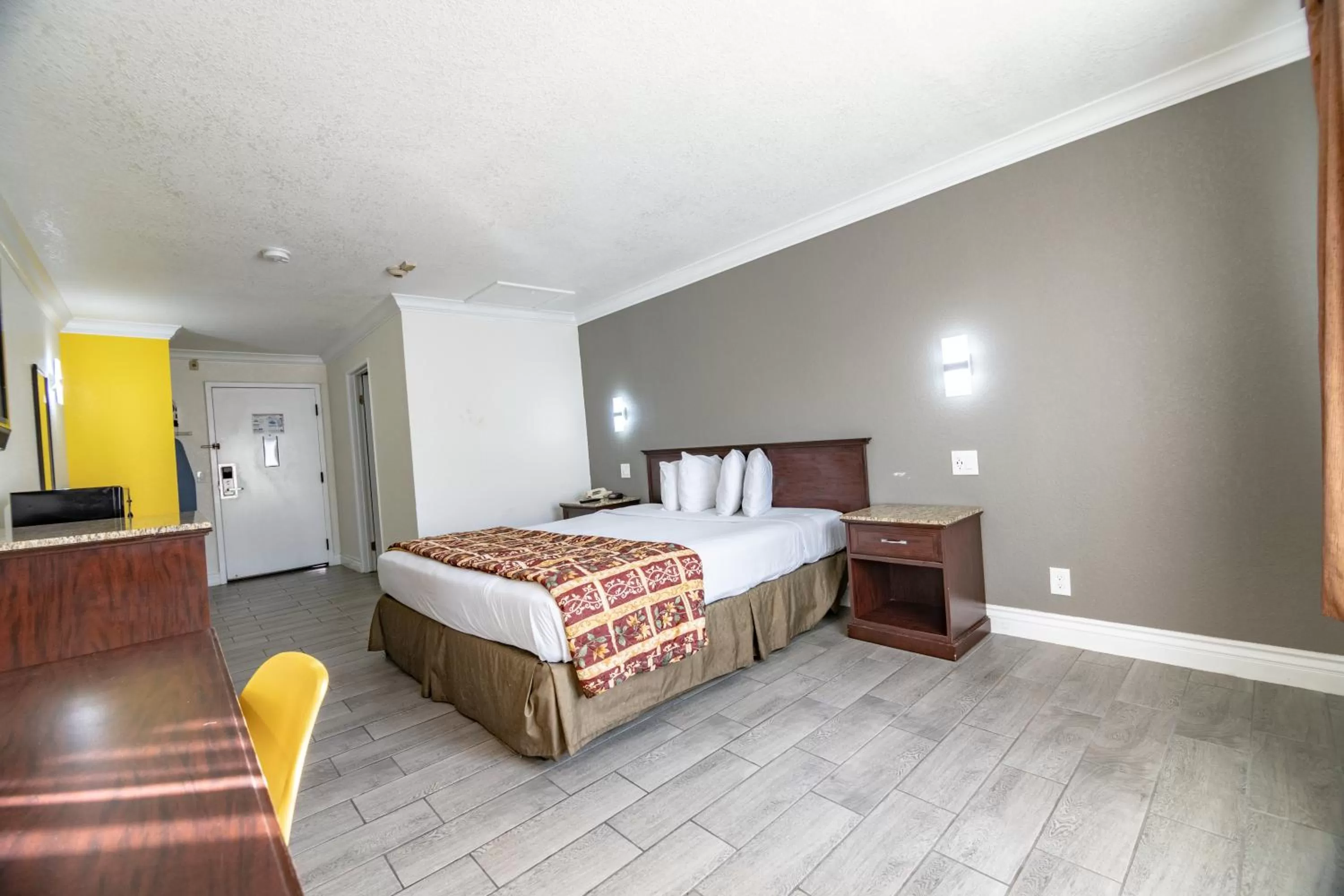 Bed in Hospitality Inn